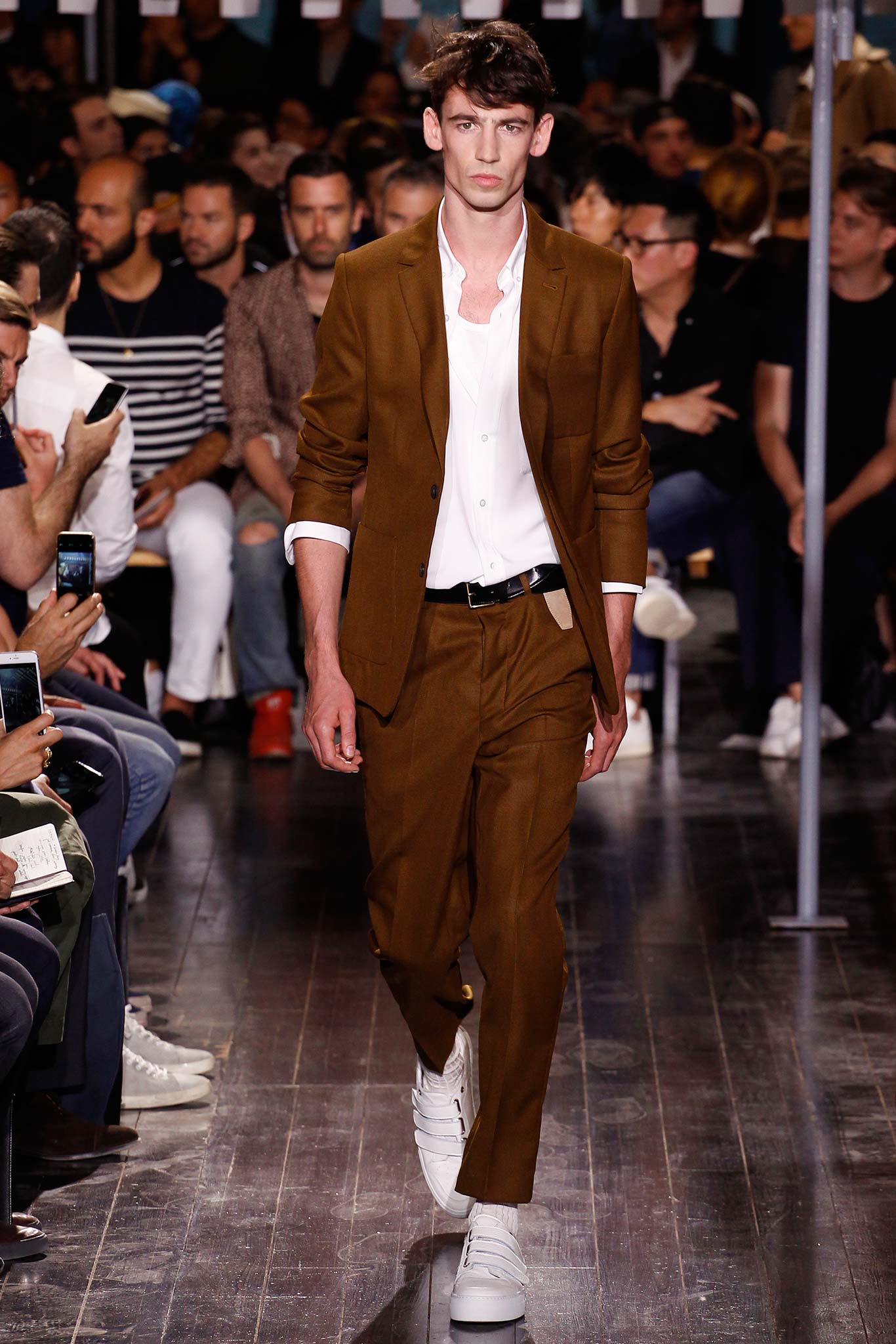 brown tailored suit with white shirt