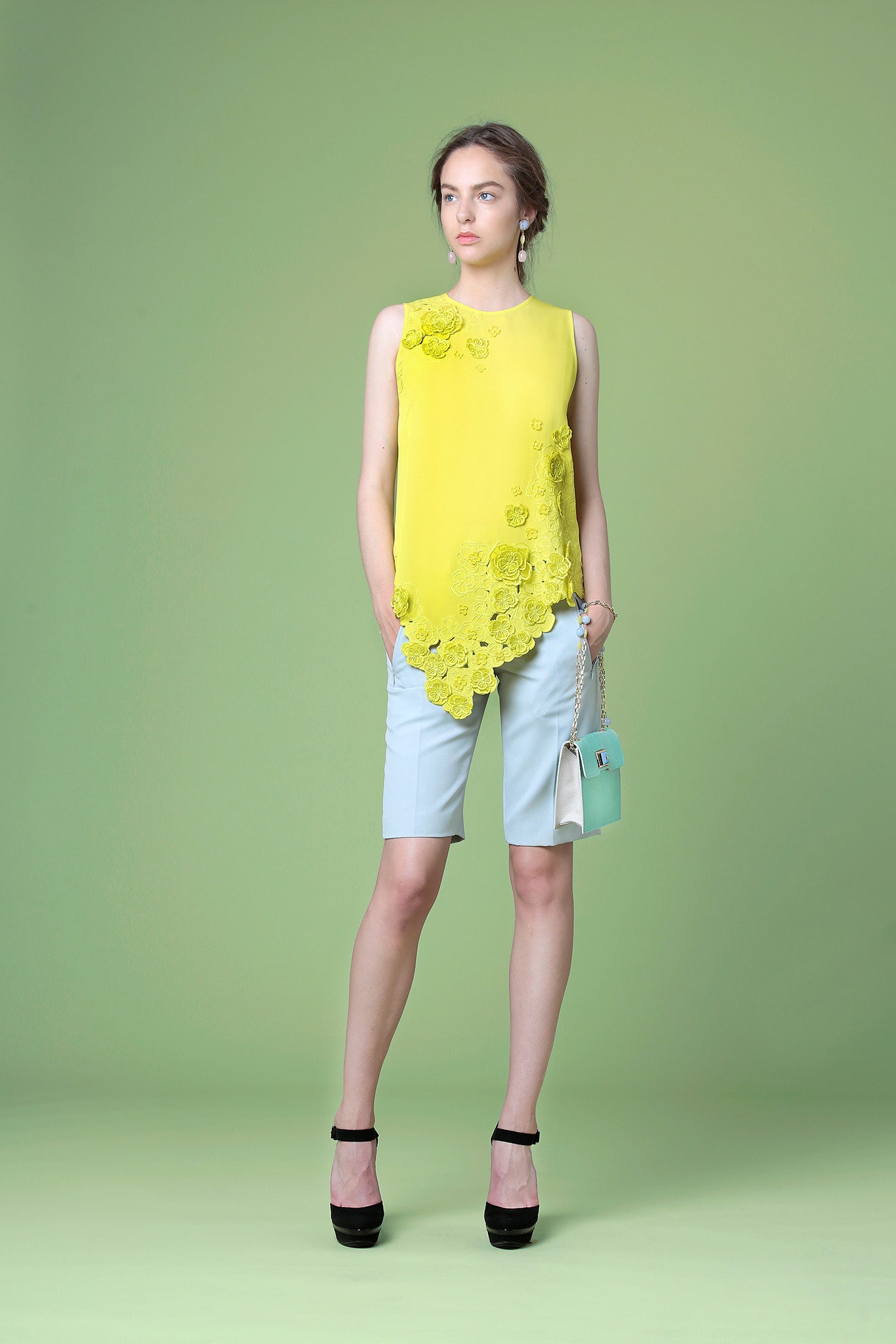yellow embroidered top with blue shorts