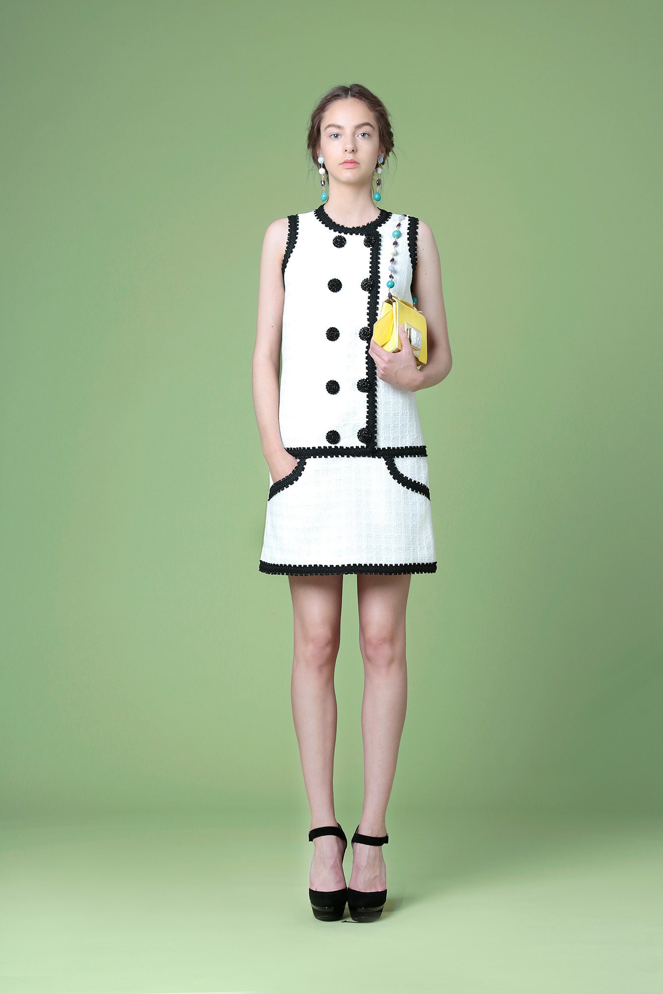 white cotton sleeveless collared fitted buttoned pockets dress