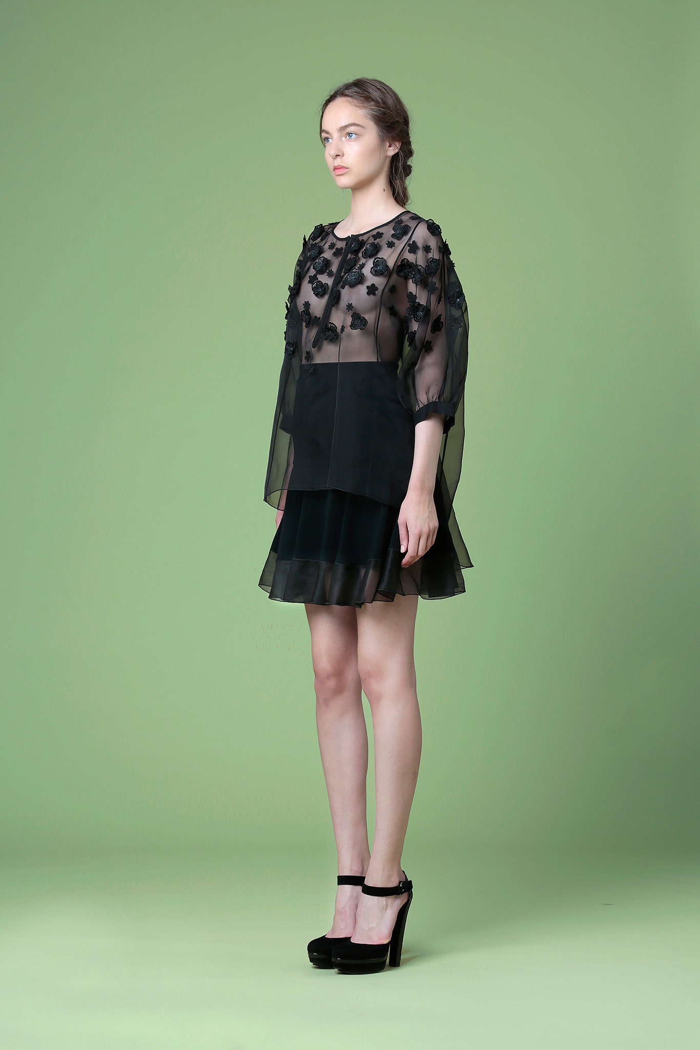 black pleated mini dress with sheer top