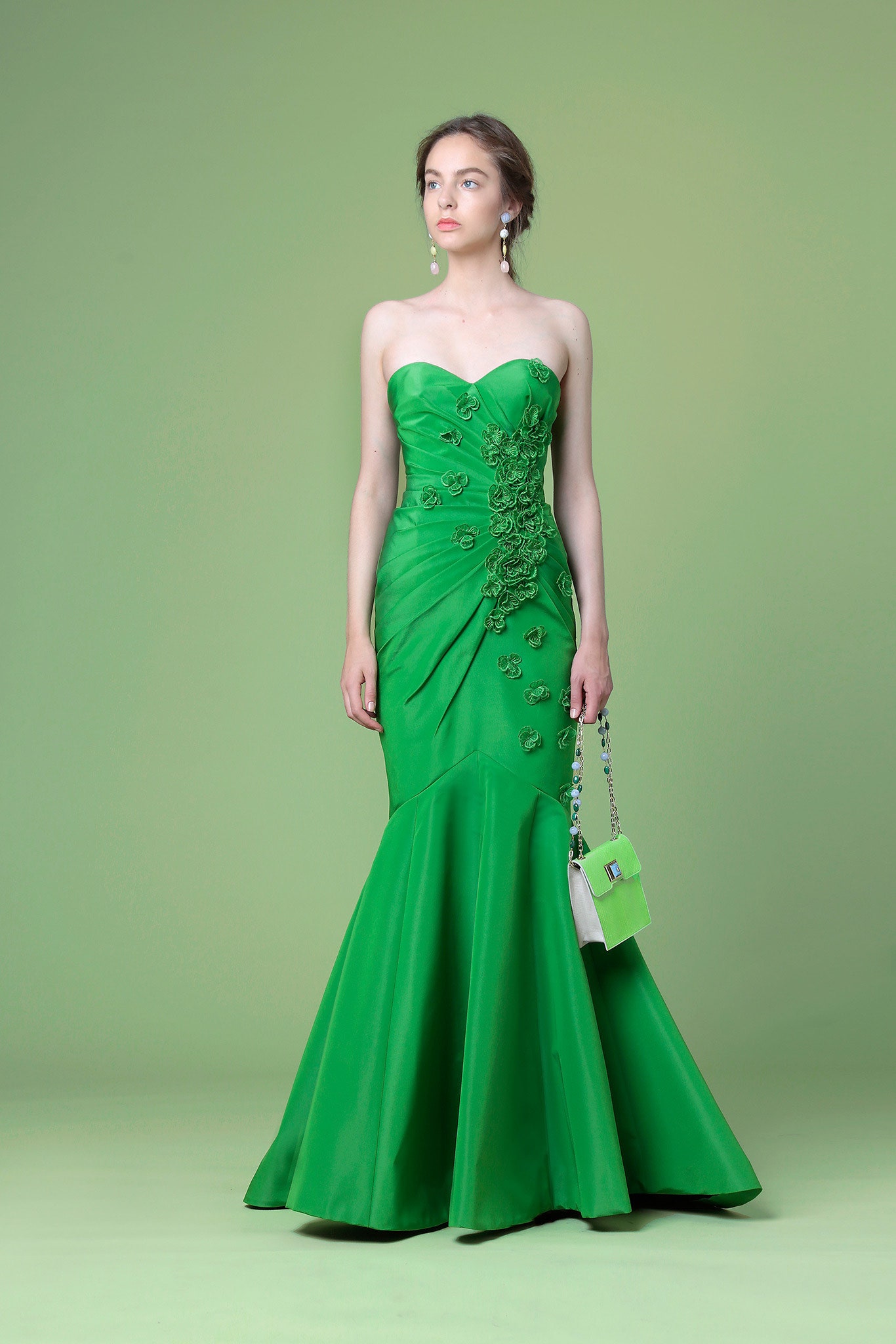 green silk strapless gown