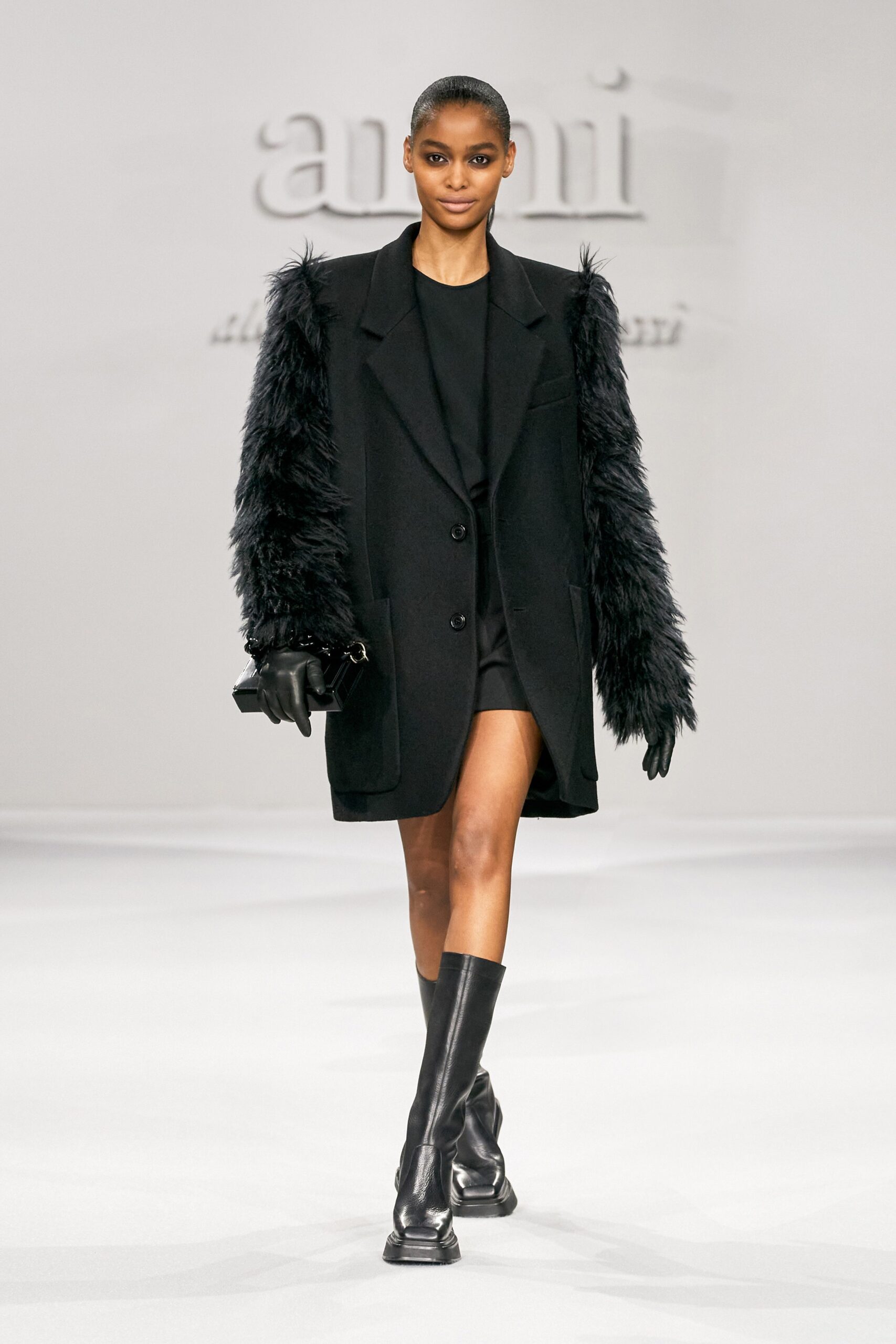 black faux-fur coat with mini dress