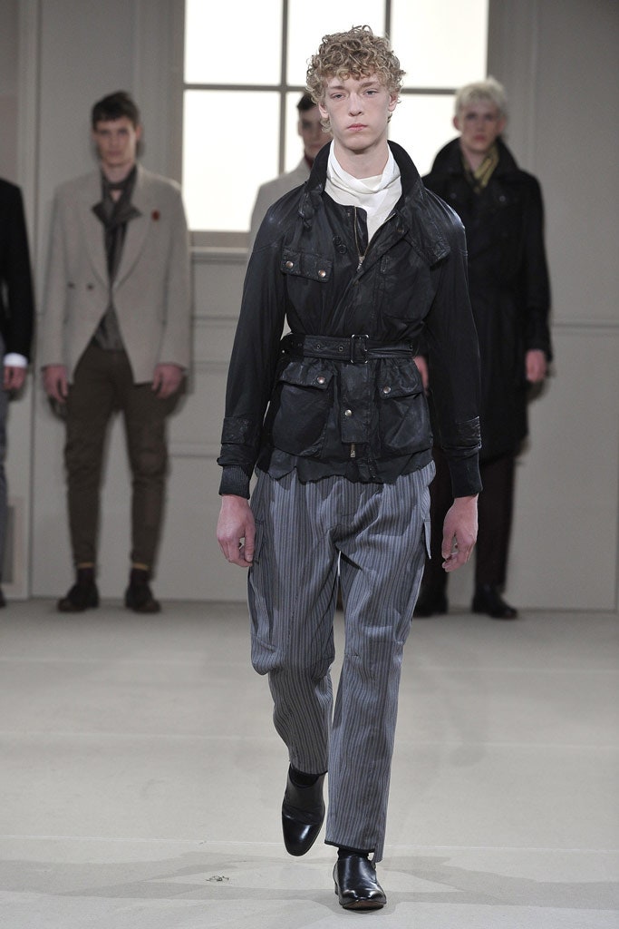 black fitted jacket with gray pants