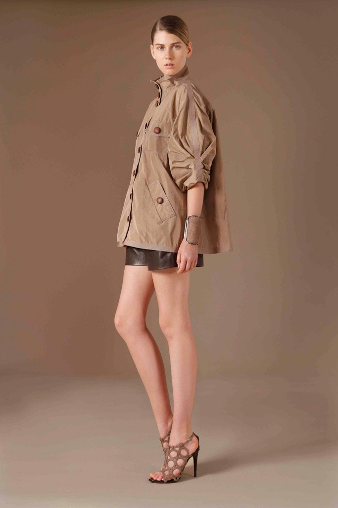 beige oversized jacket with black leather shorts