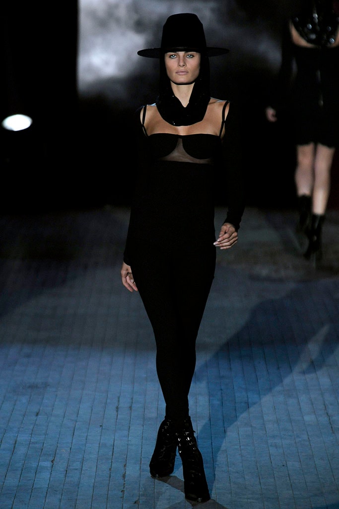 black fitted catsuit with hat