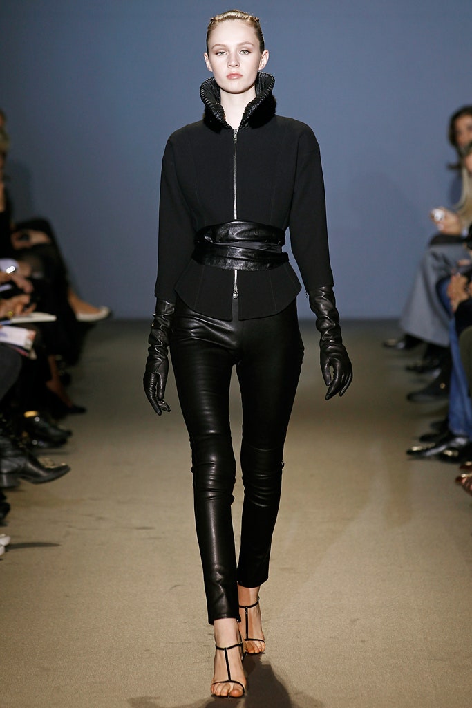 black fitted jacket and leather pants