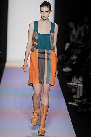 color-blocked mini dress with knee-high boots