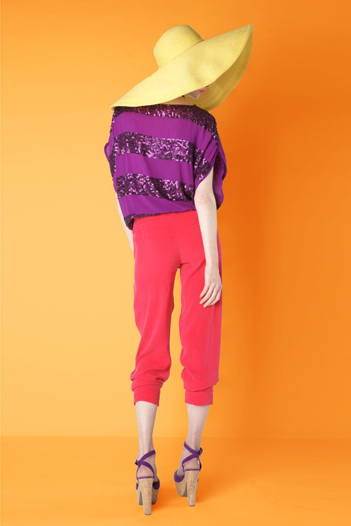 purple sequined top with pink pants