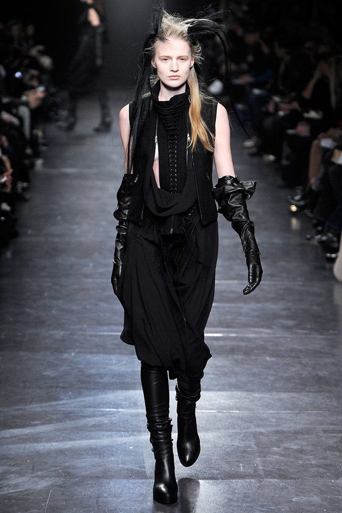 black relaxed midi dress with gloves and boots