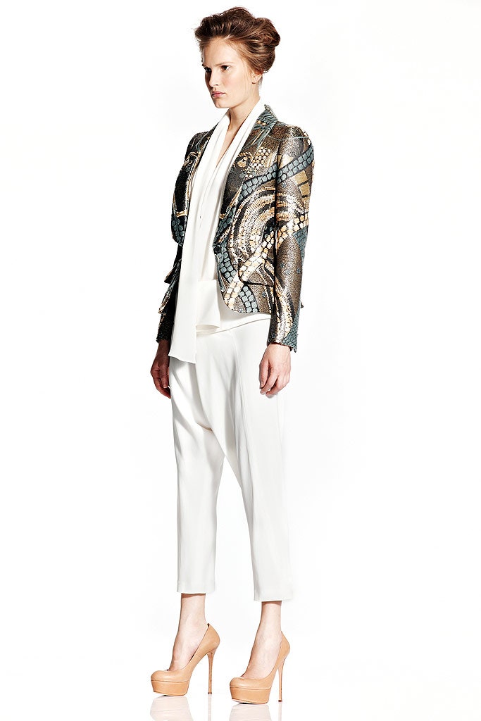 gold embroidered fitted jacket with white top