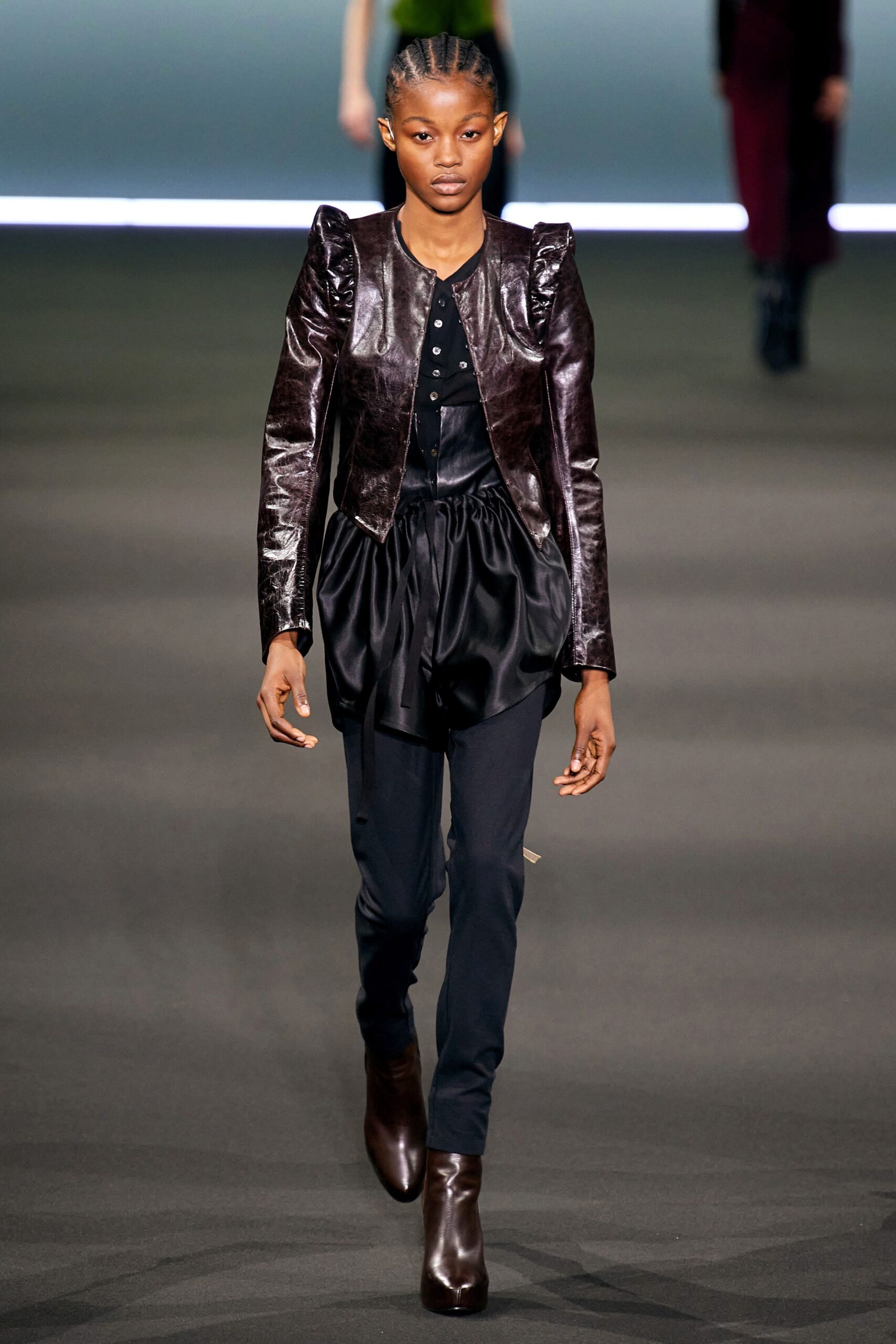 brown leather jacket with black top