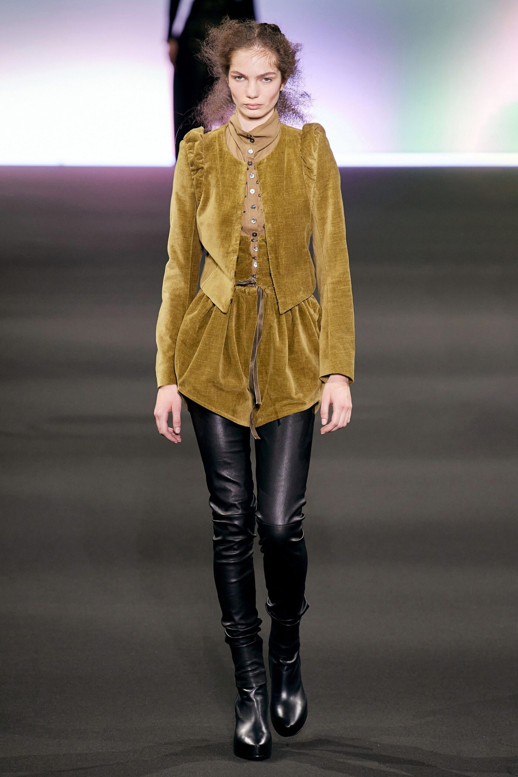 fitted green velvet jacket and black leather pants