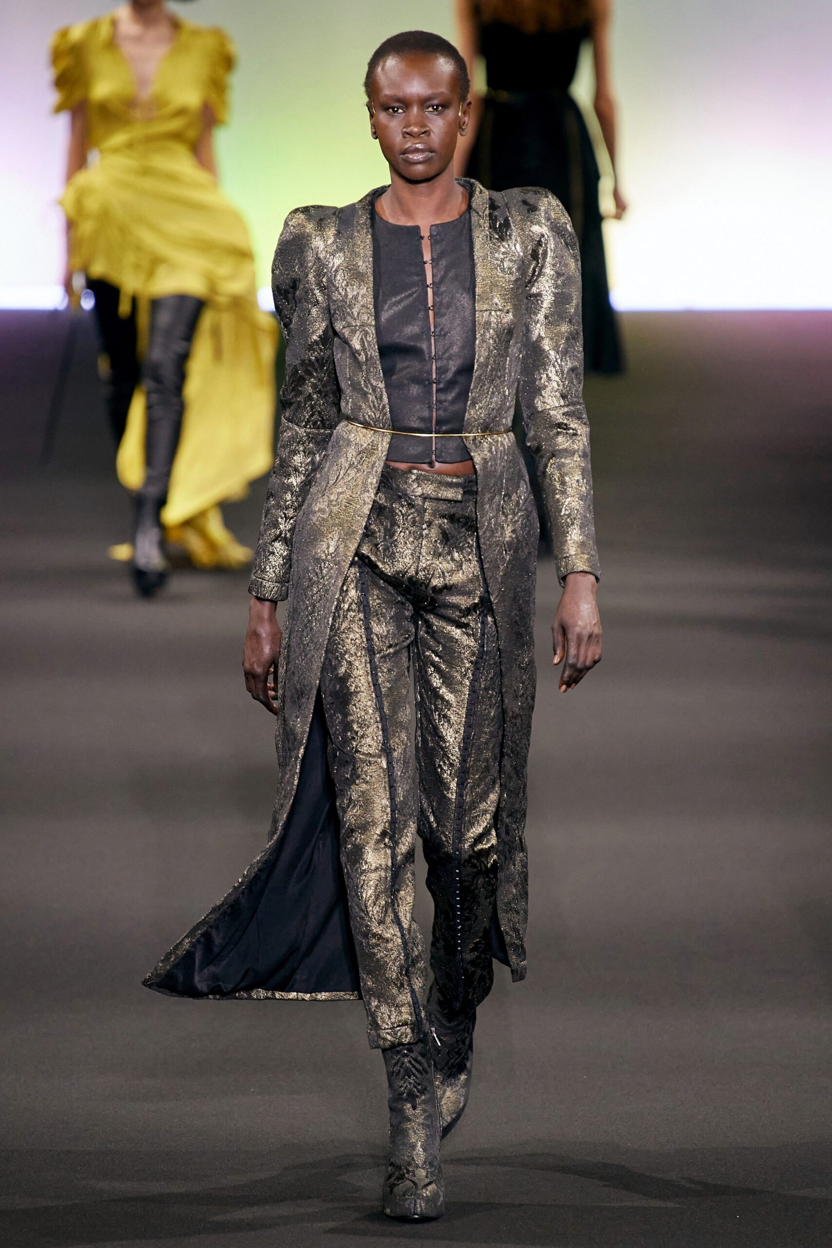 gold and black fitted suit