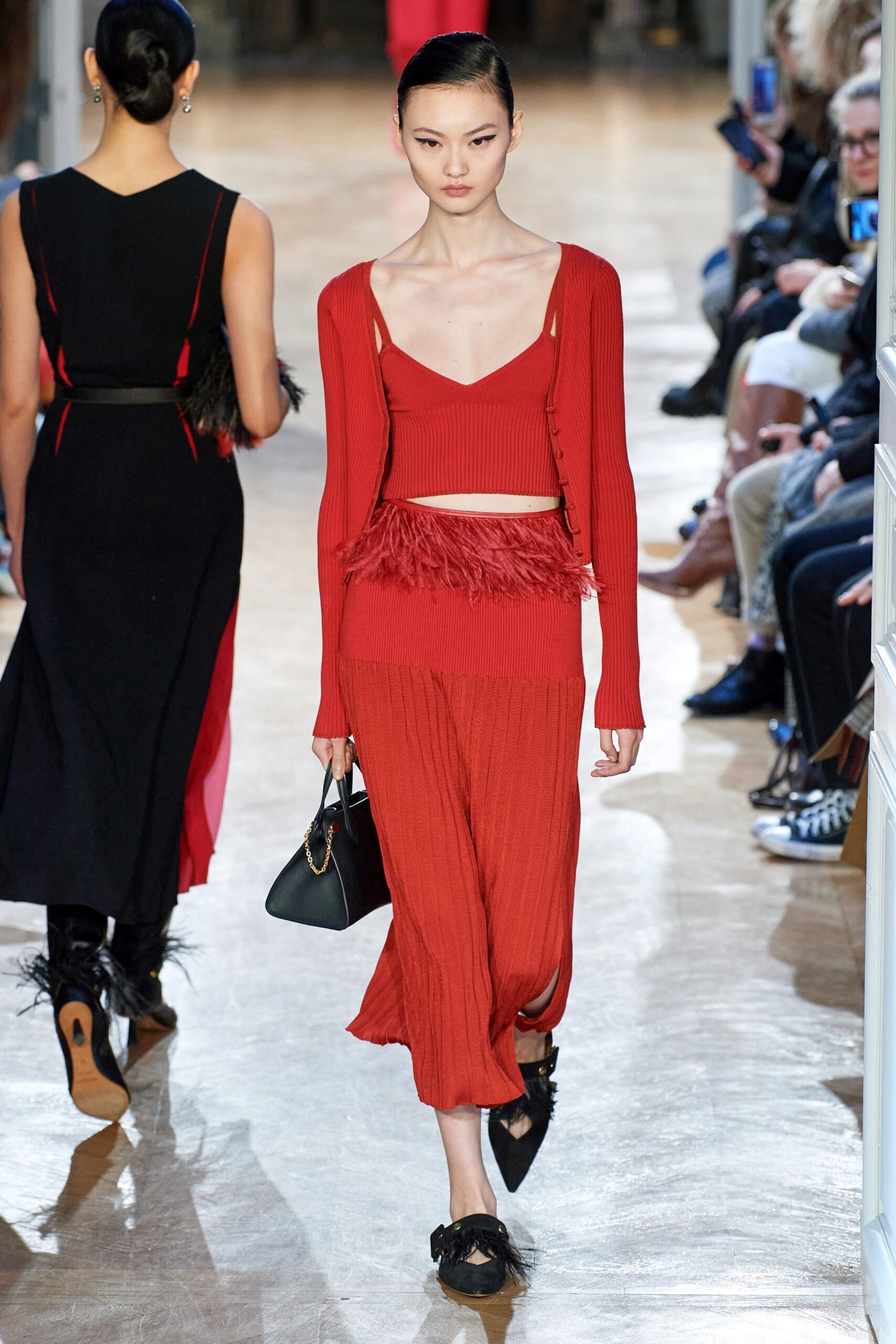 red fitted top and skirt