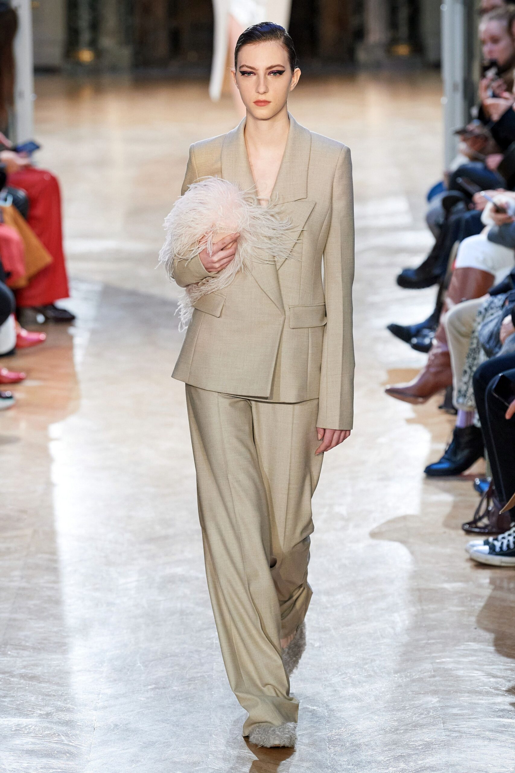 beige tailored suit with embellished shoes