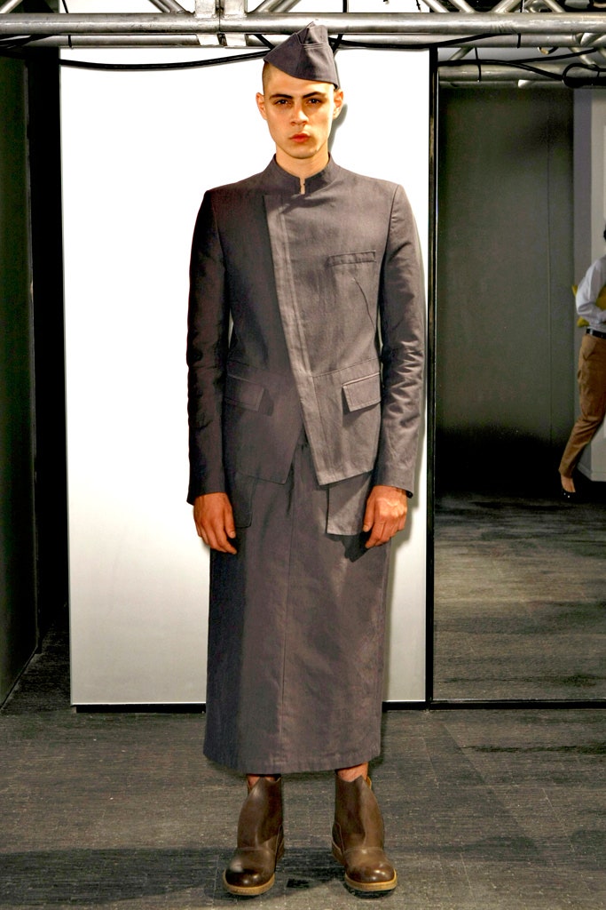 gray asymmetric suit with hat