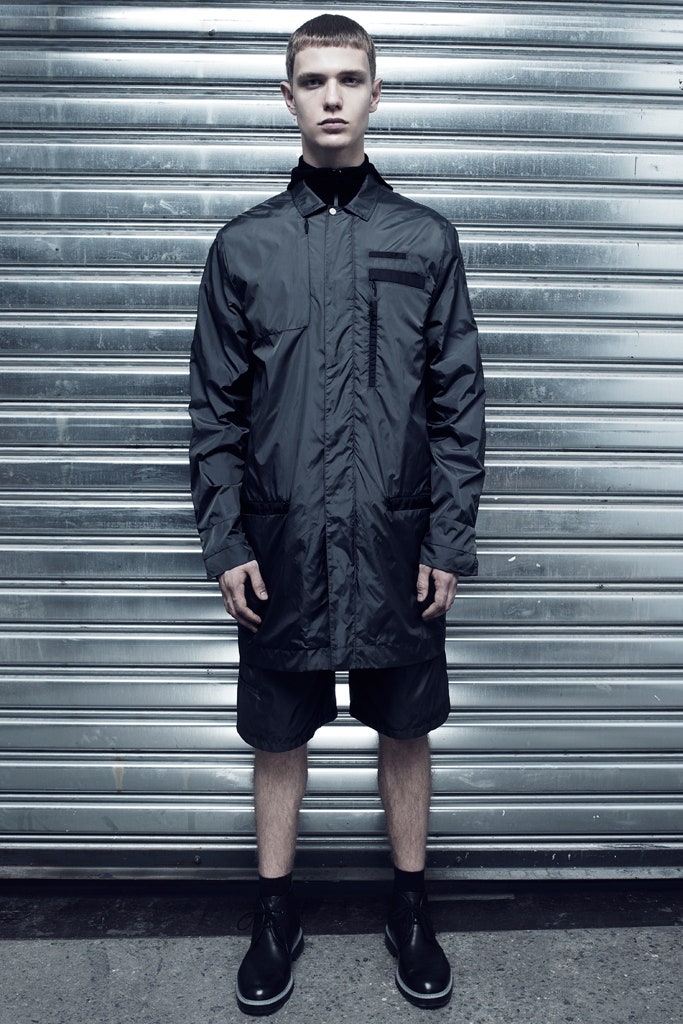 black vinyl jacket and shorts