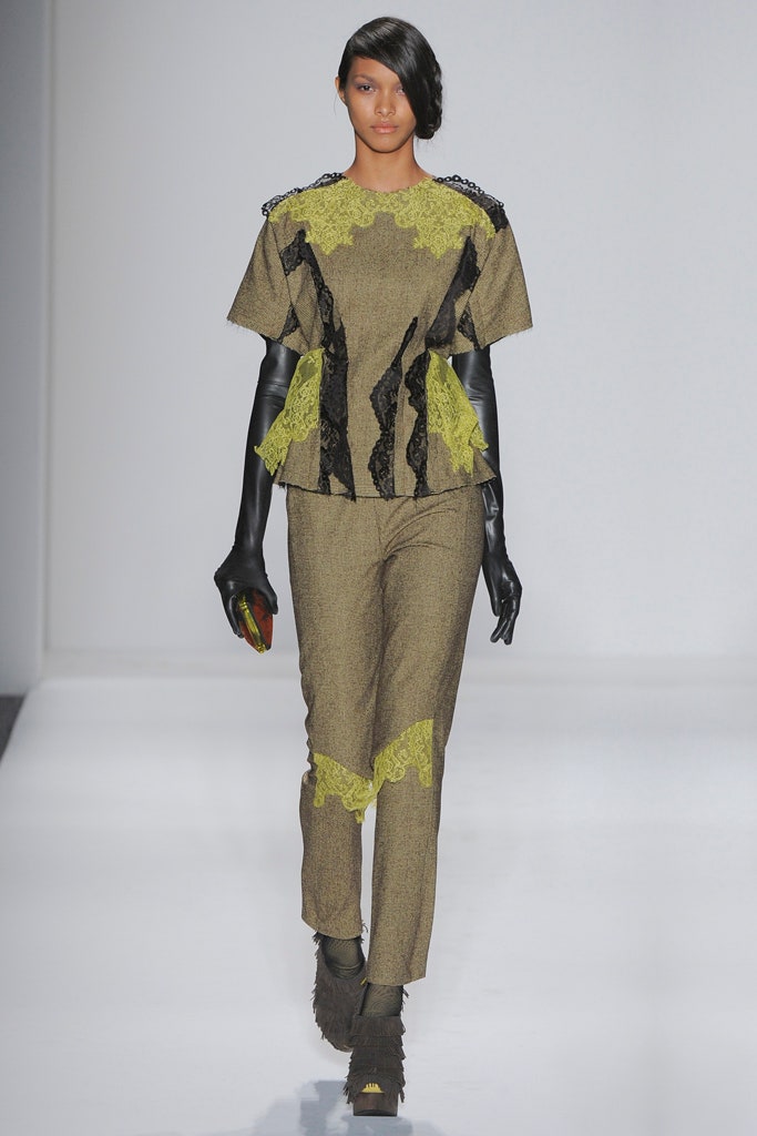 brown and black layered top with slim pants