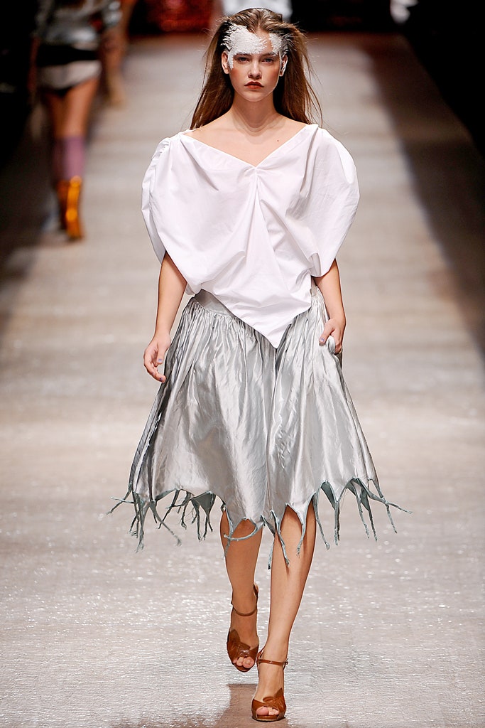 white draped top with silver skirt