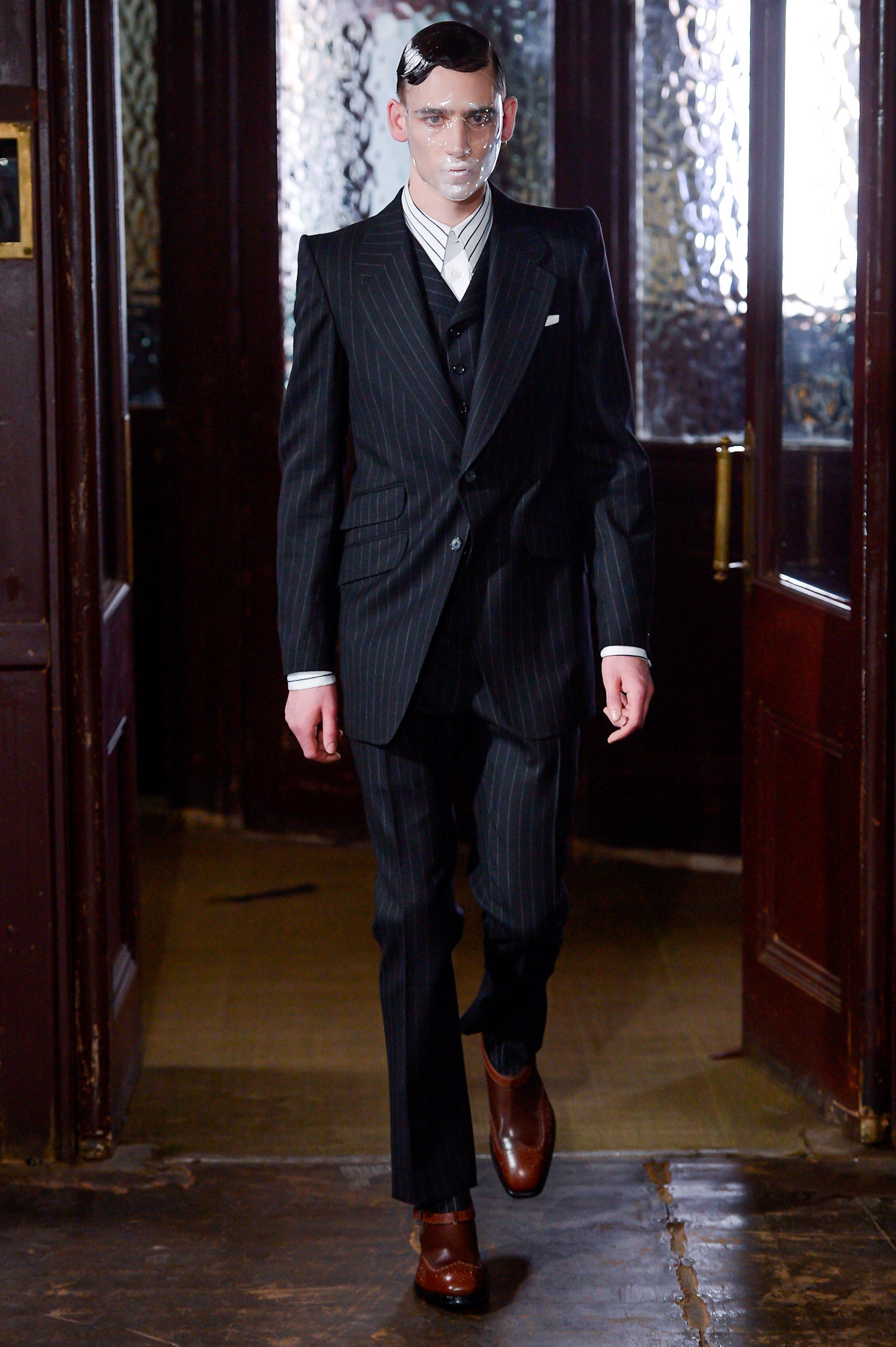 black tailored suit with white shirt