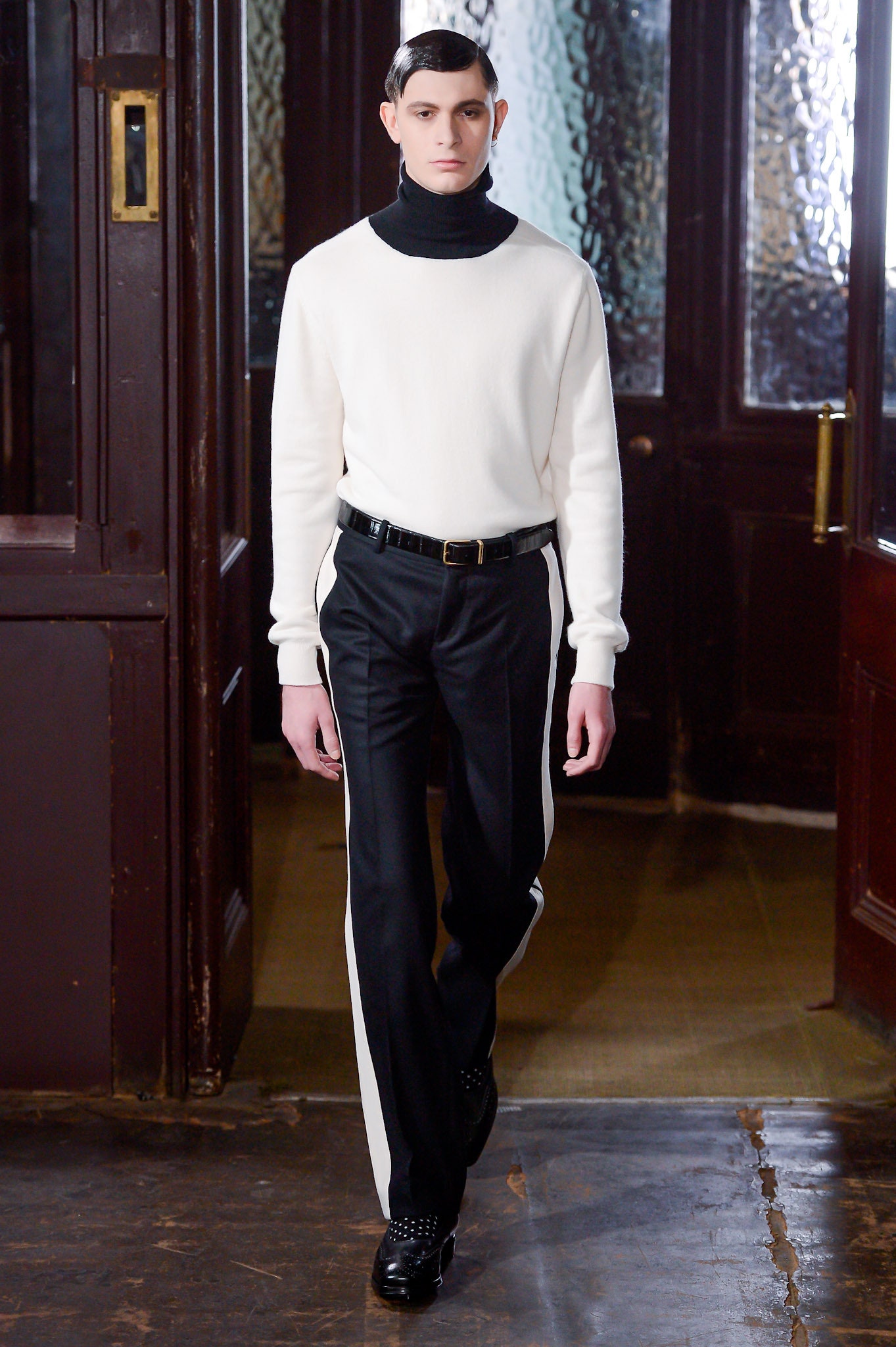 fitted white wool sweater and tailored black pants