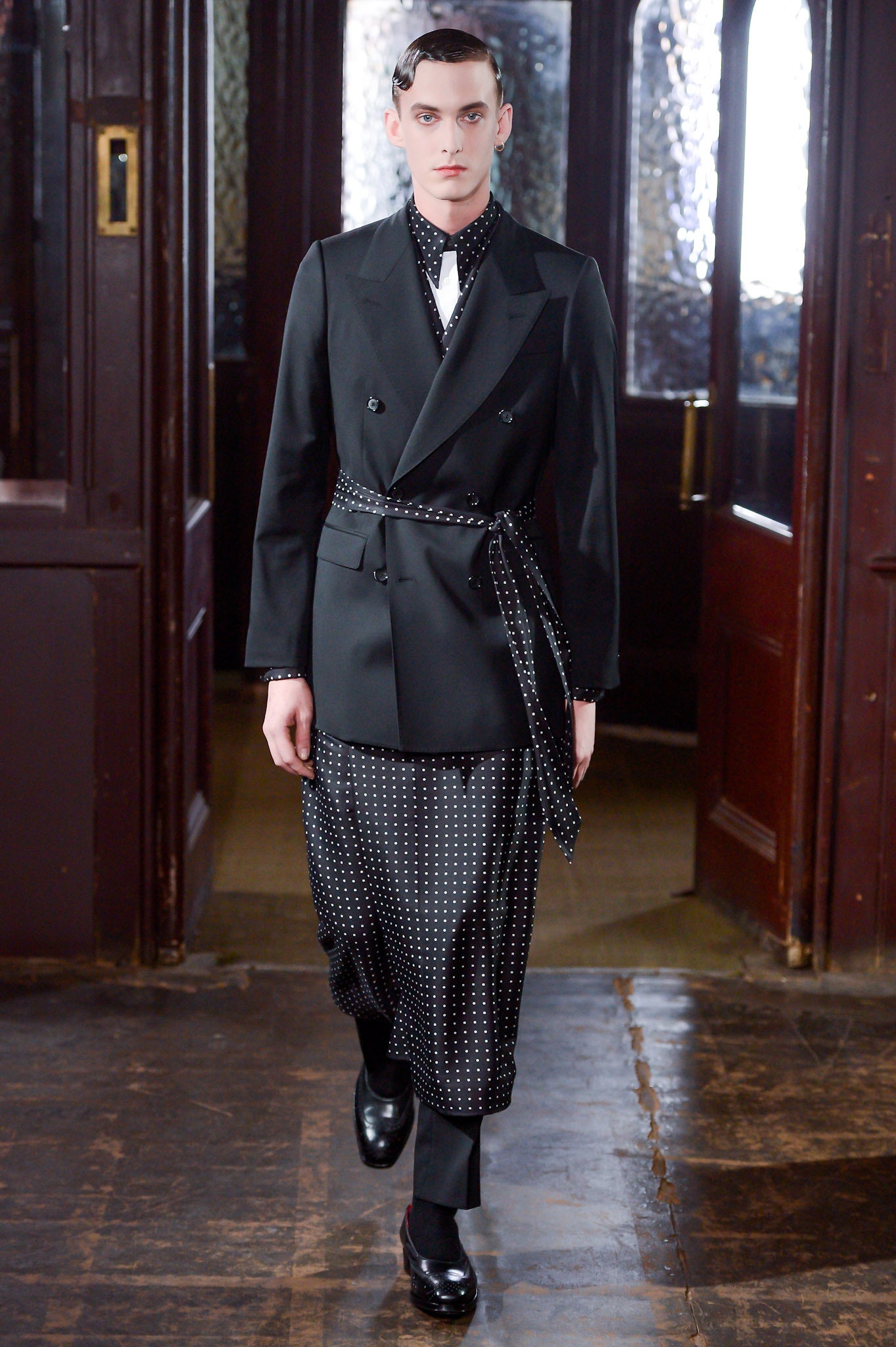 black tailored blazer with polka-dot scarf