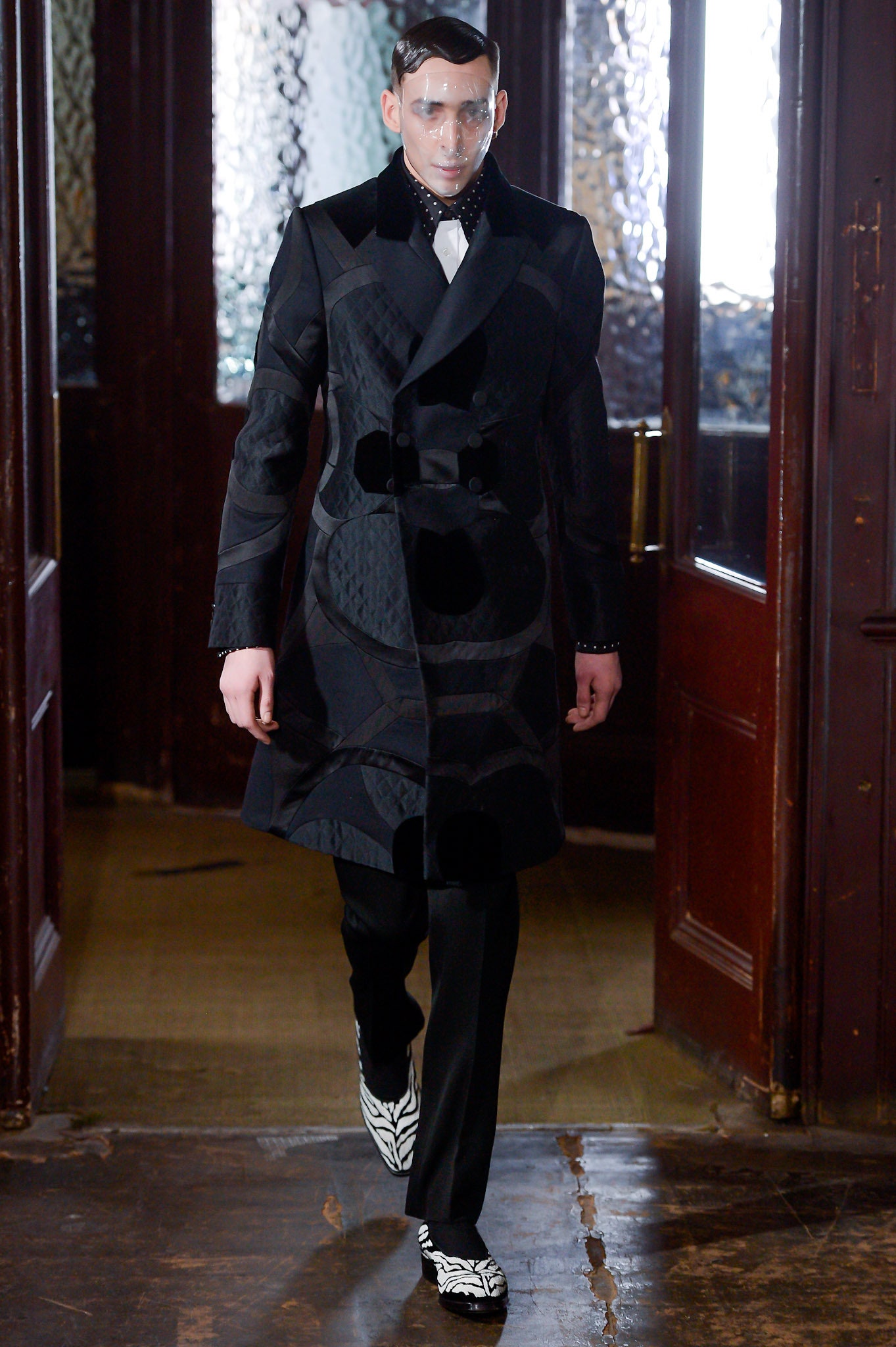 black wool coat with tailored pants