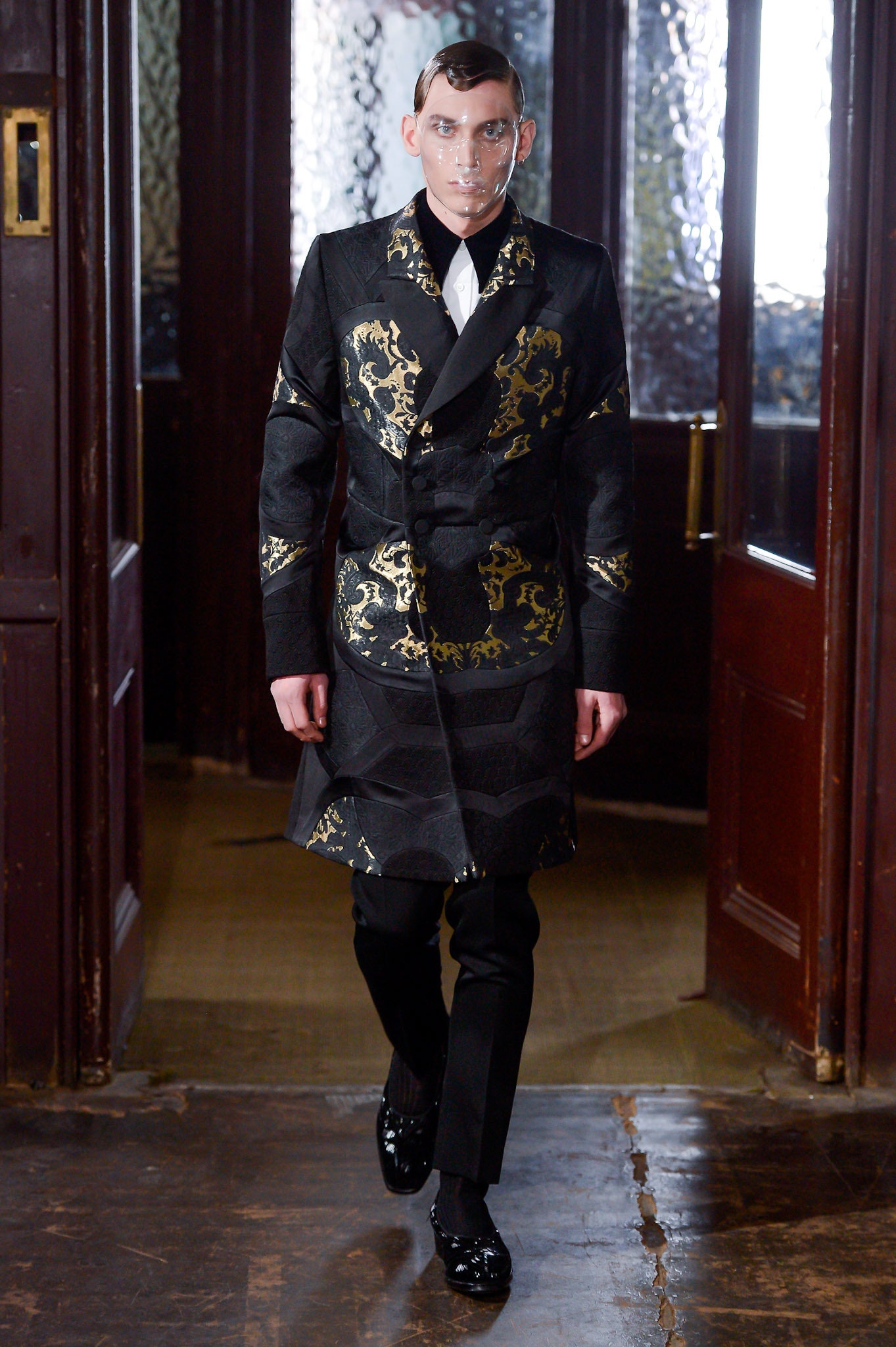 black and gold embroidered coat