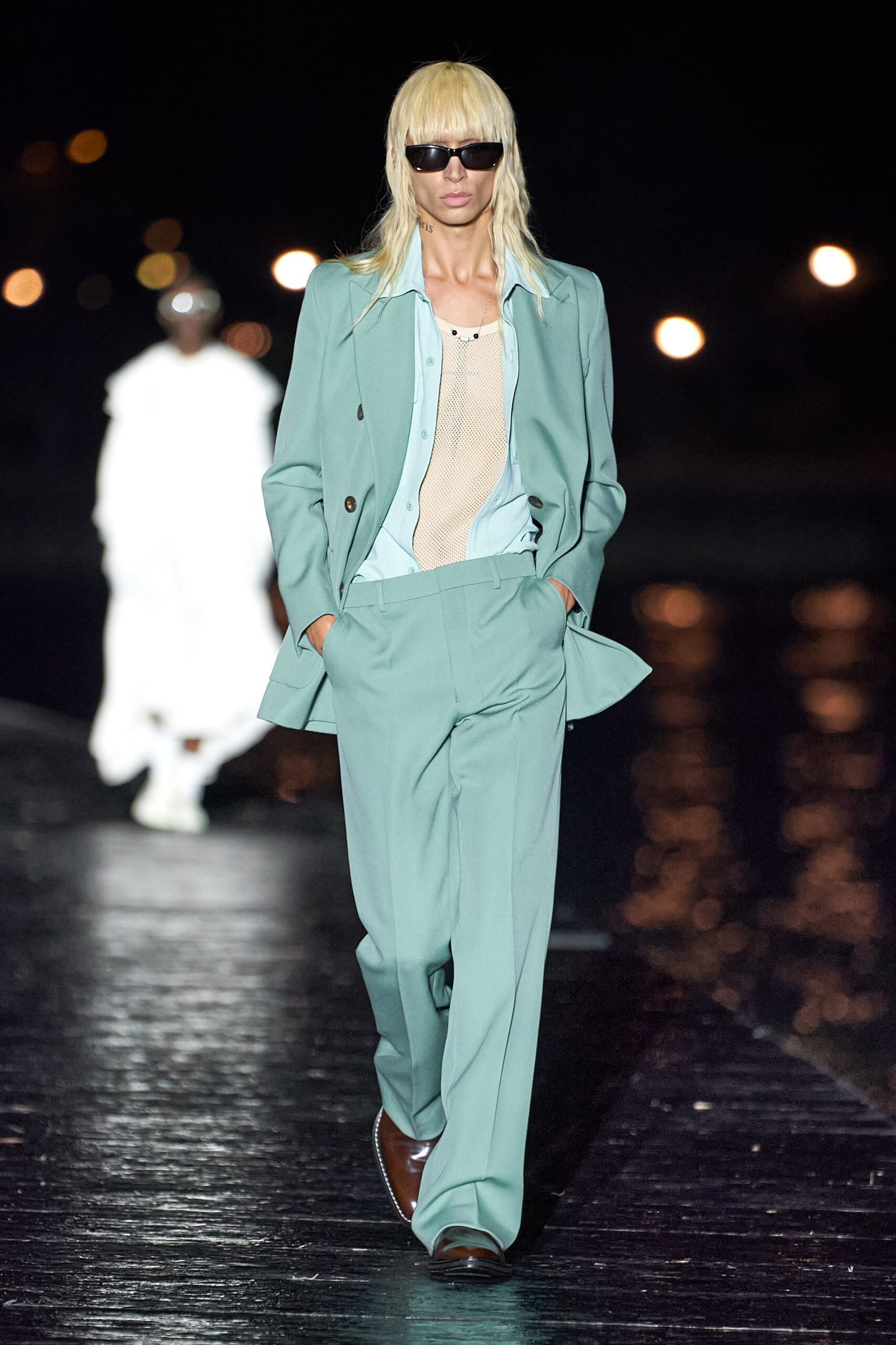 teal tailored suit with beige top