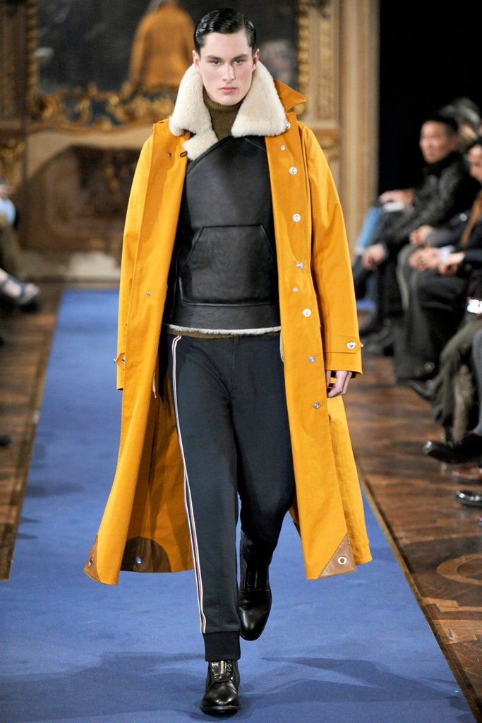 yellow coat black leather top