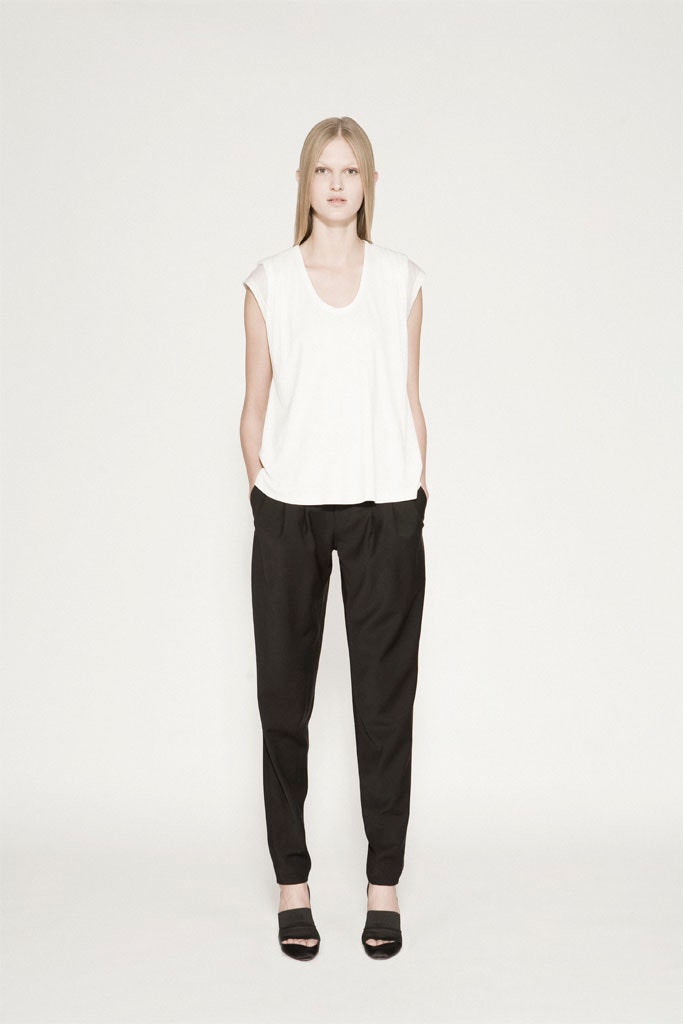 white relaxed top with black pants