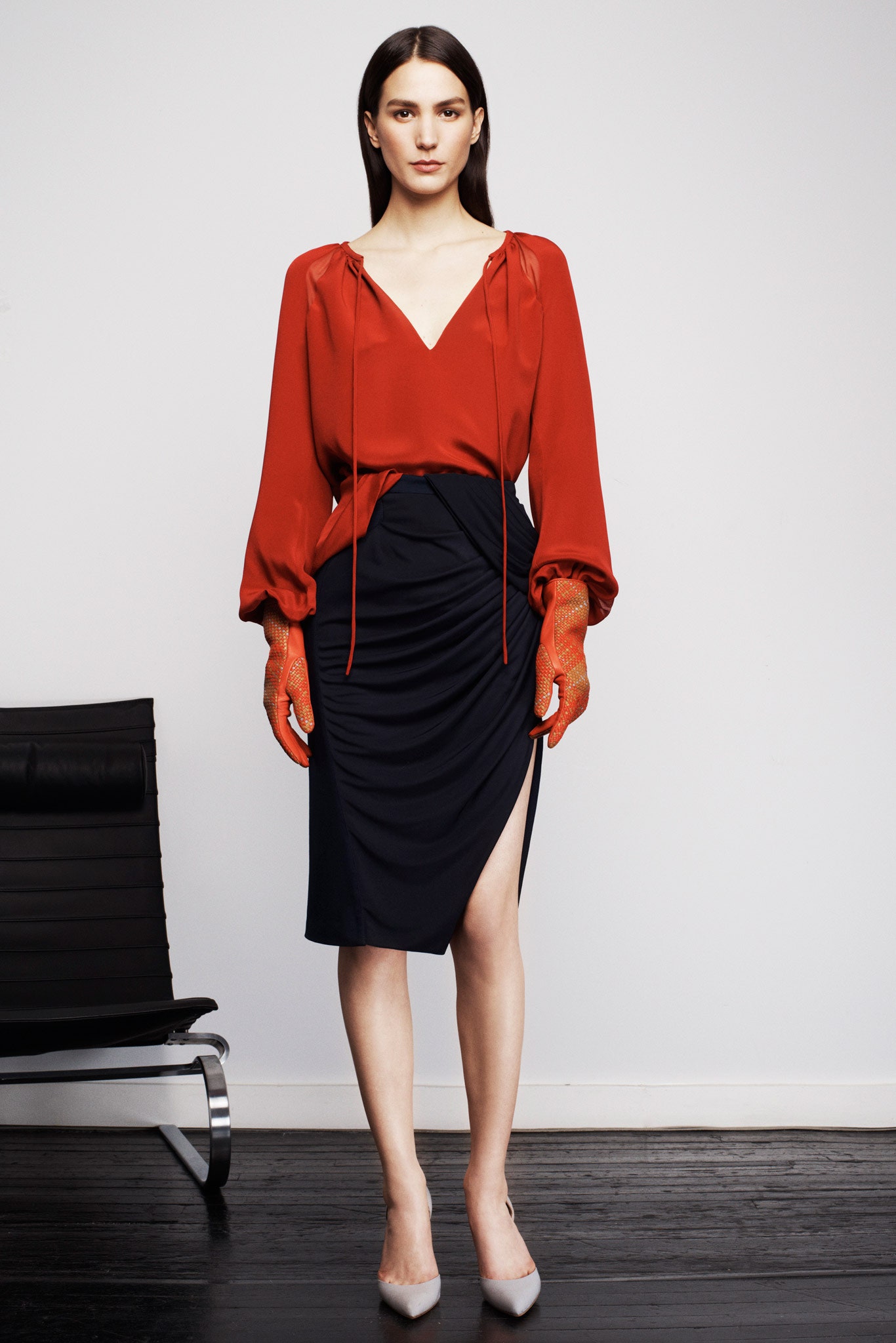 red silk top and black pencil skirt