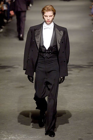 black tailored suit with gloves