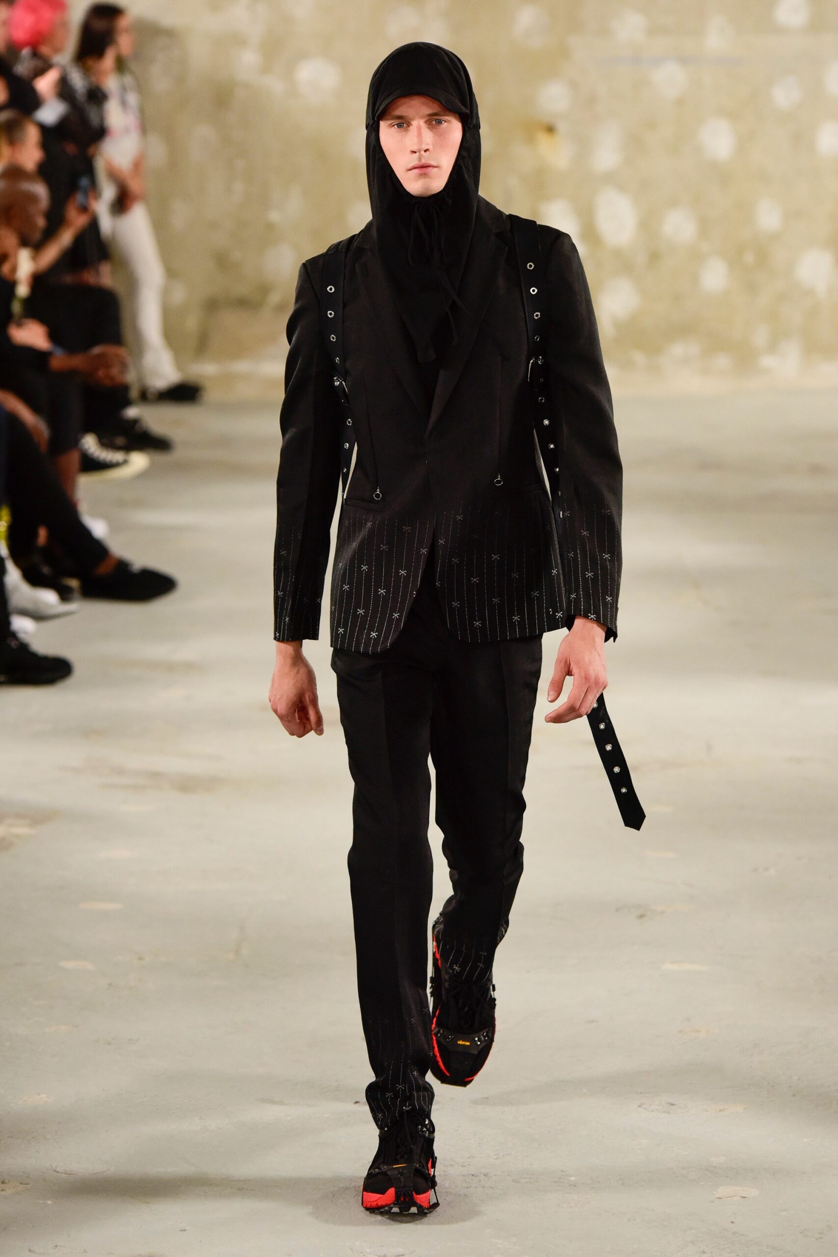 black tailored suit with hat