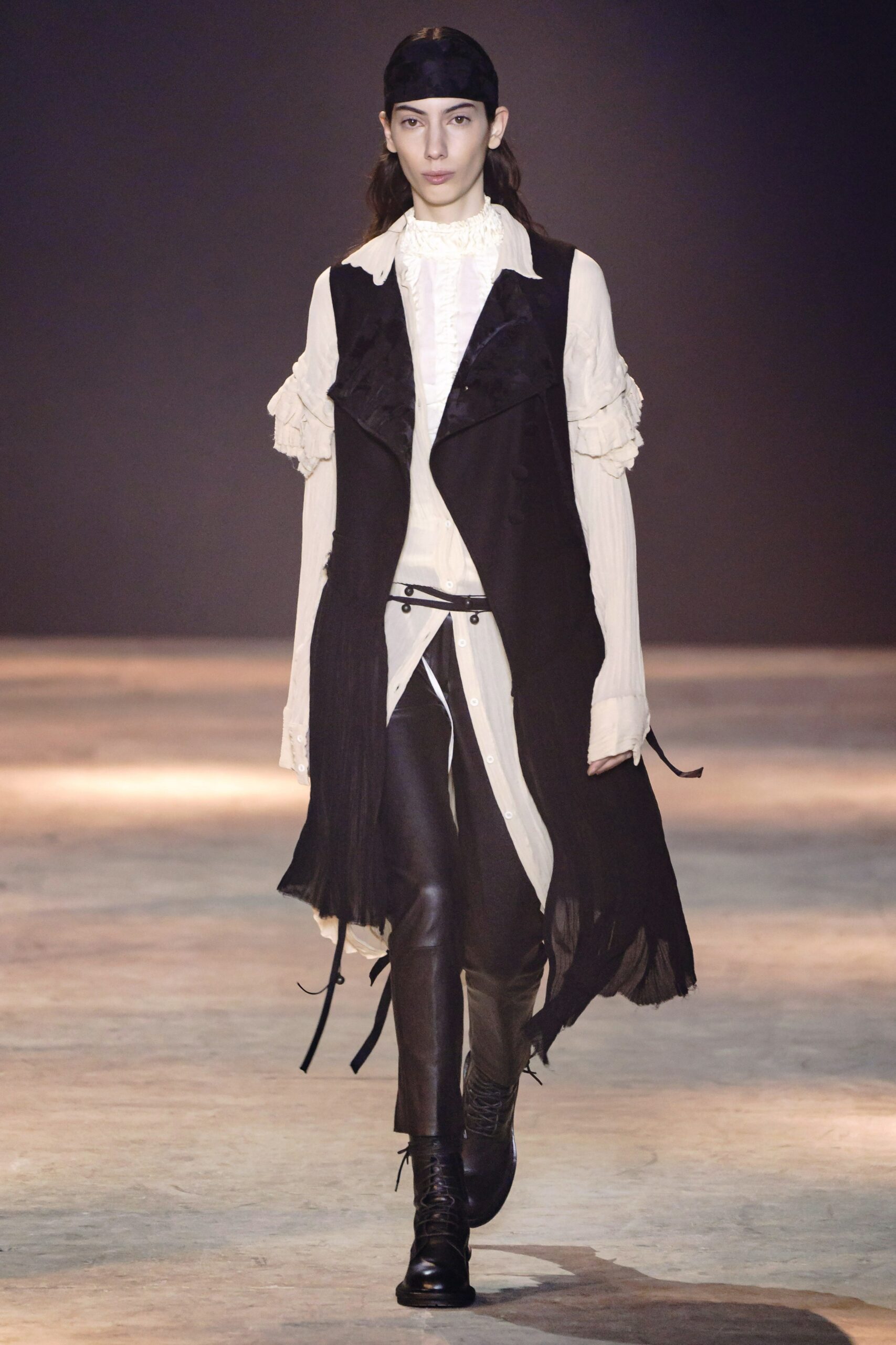 black vest white shirt leather pants