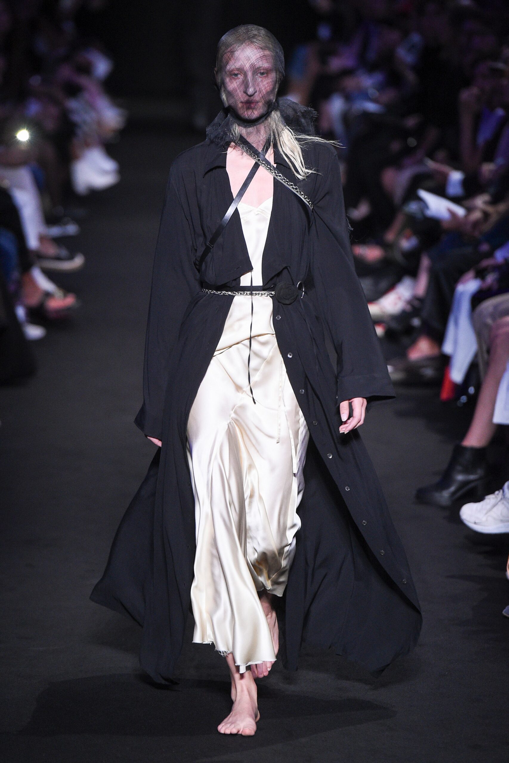 black coat and white dress