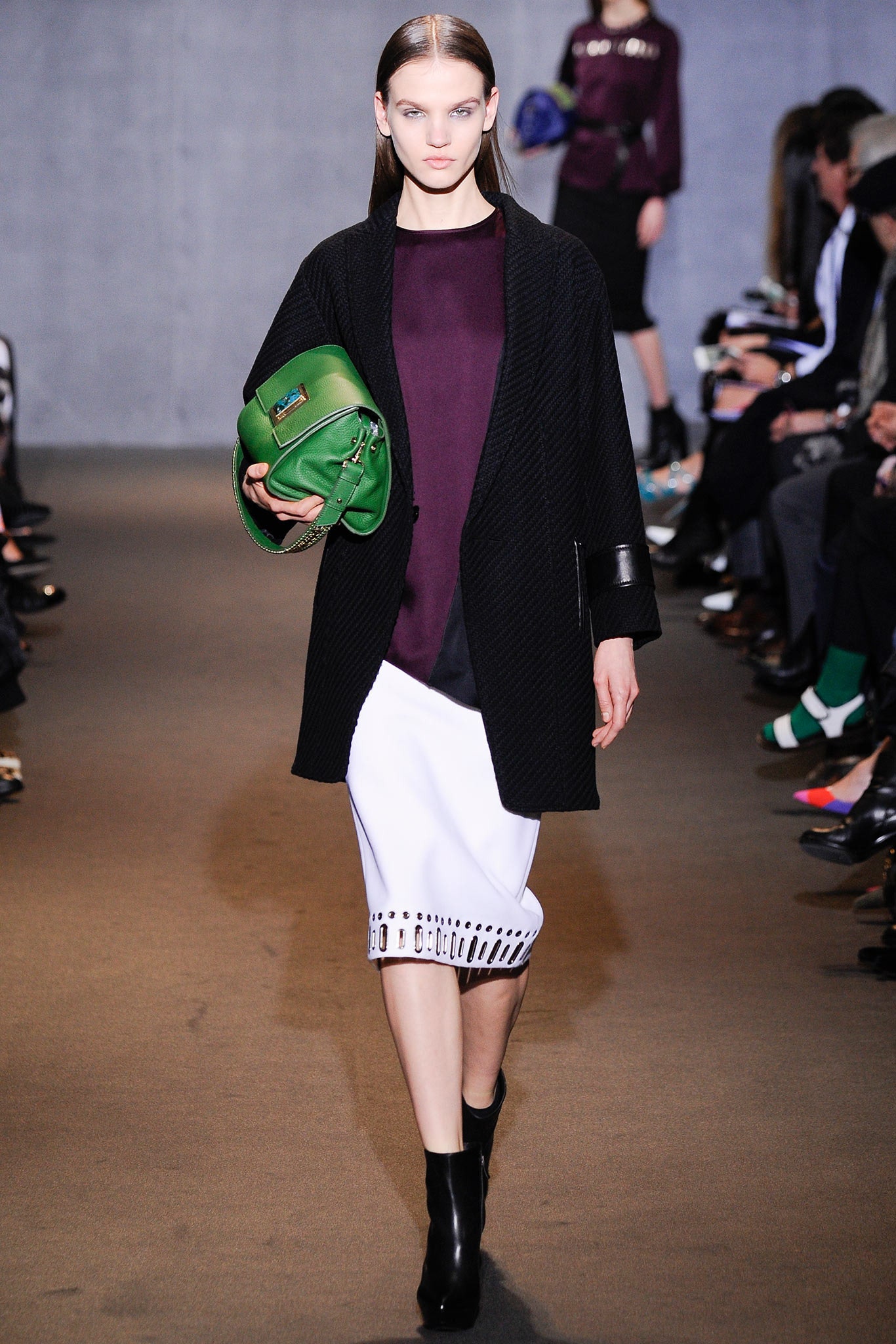 black coat purple top white skirt