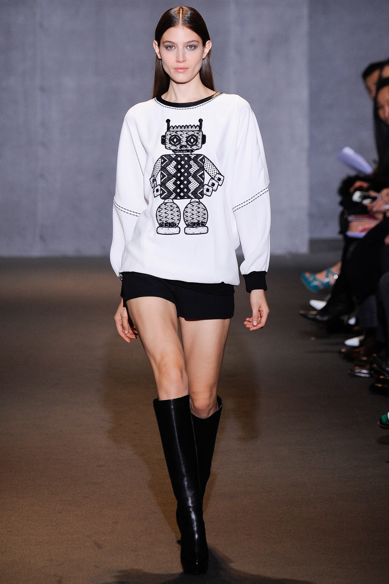 white printed top with black shorts