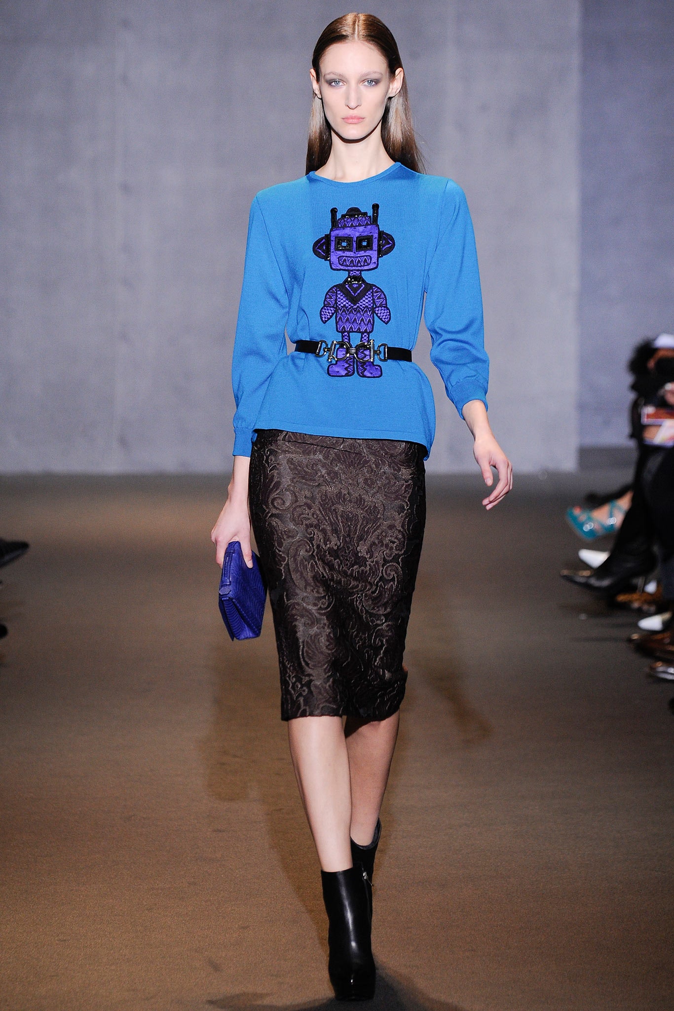 blue fitted top with black pencil skirt