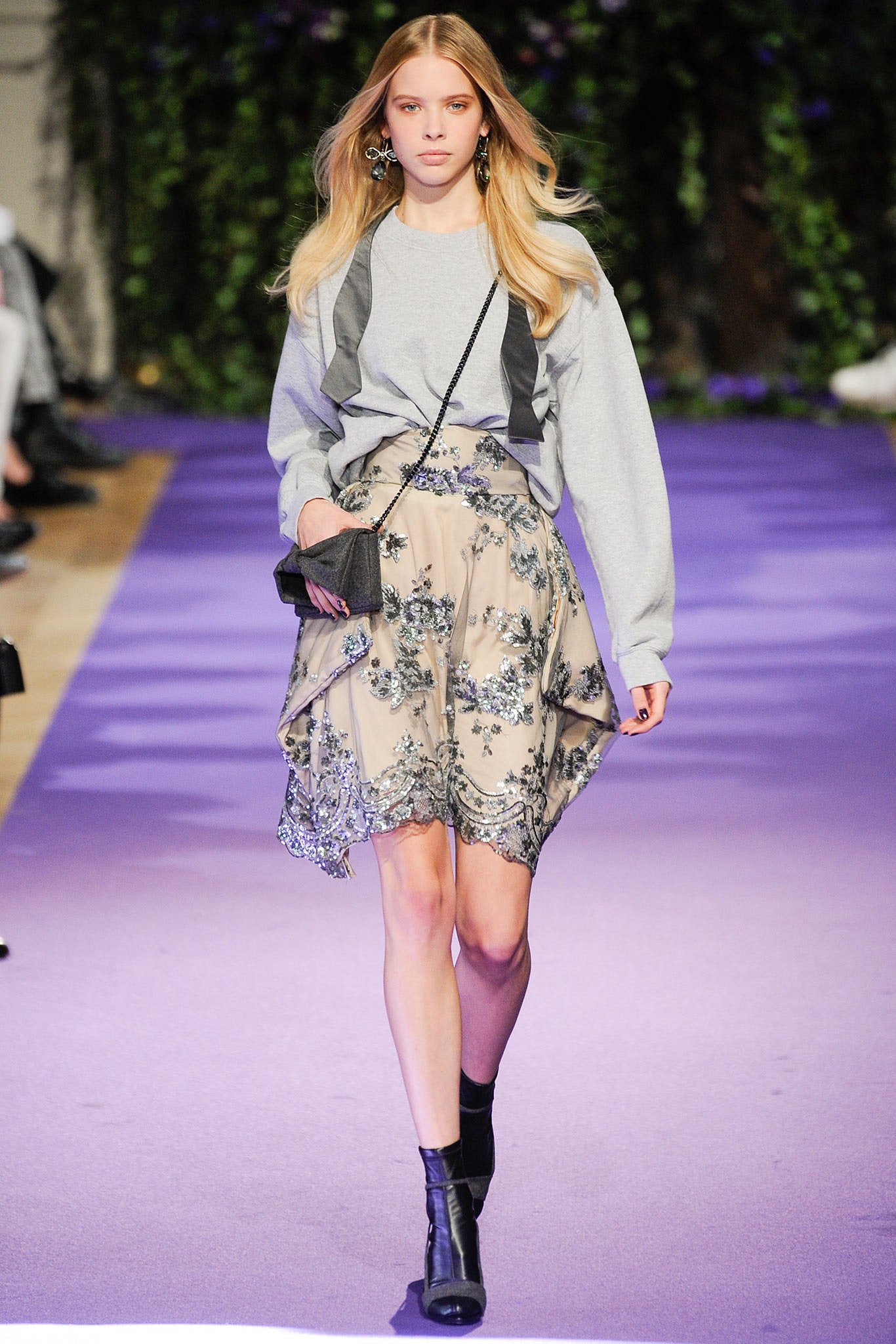 gray relaxed sweater with beige skirt