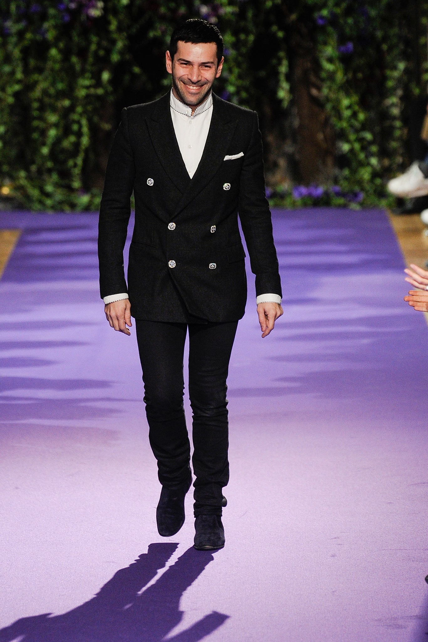 black tailored blazer and slim pants