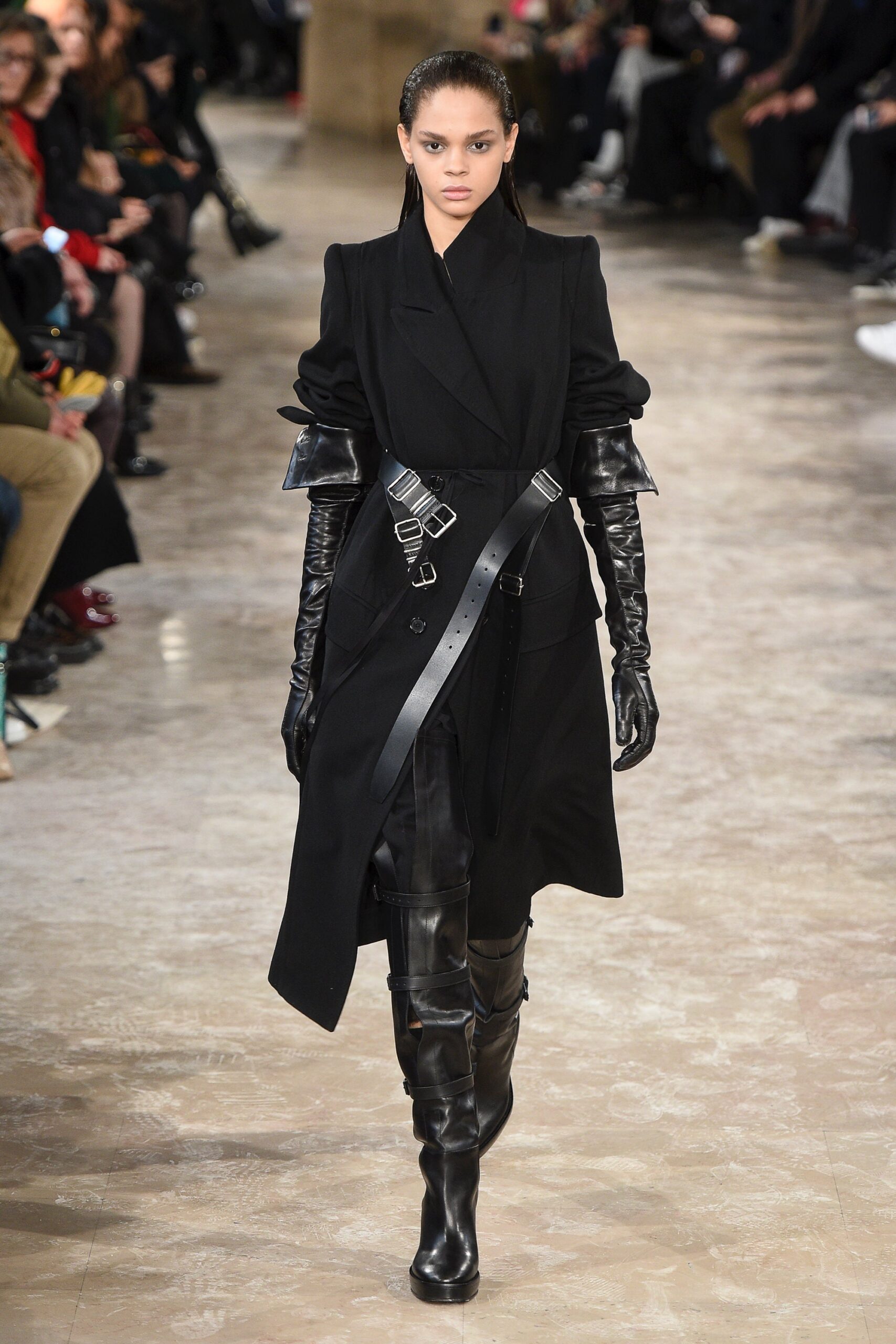 black fitted coat with gloves and boots