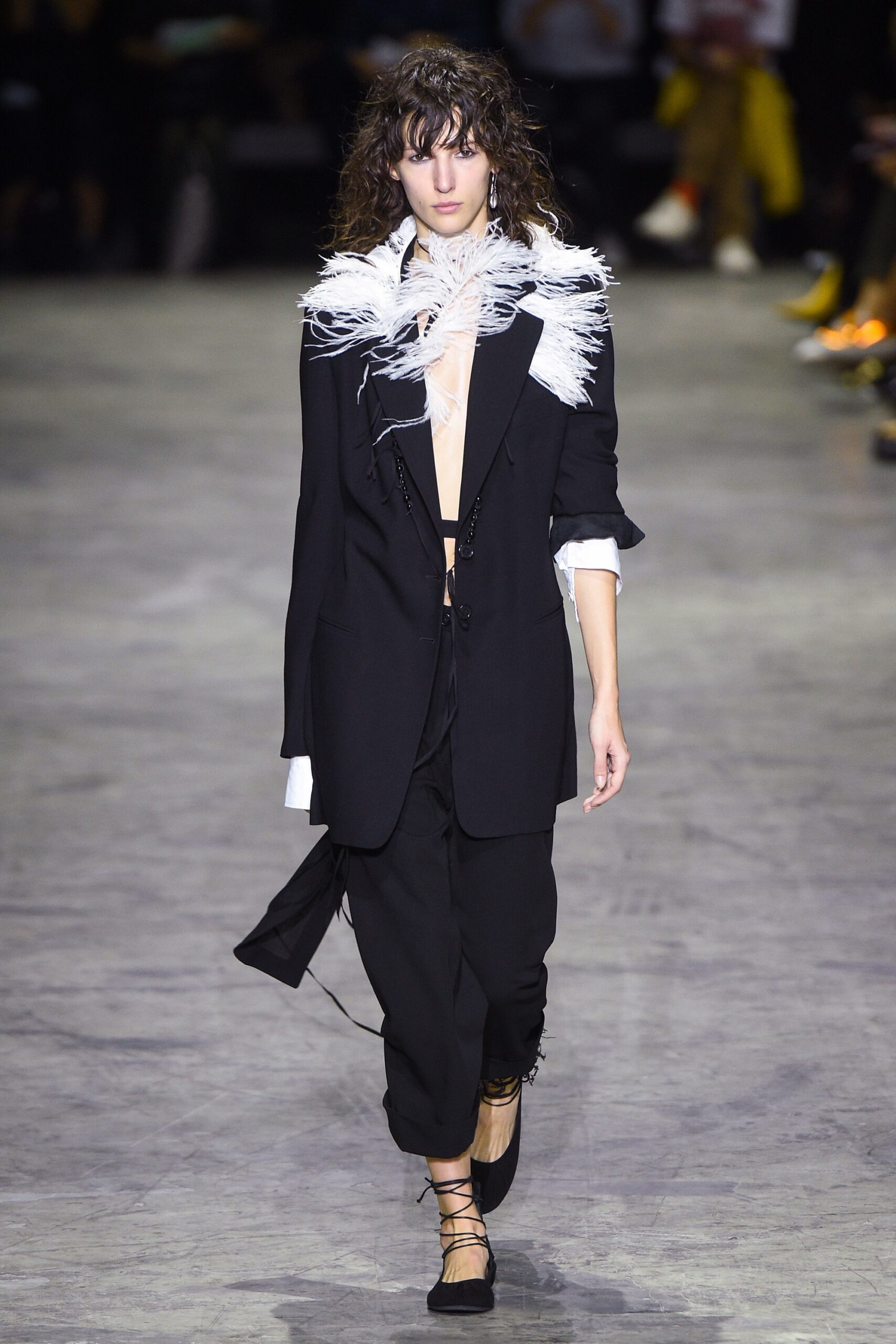 black tailored blazer with relaxed pants