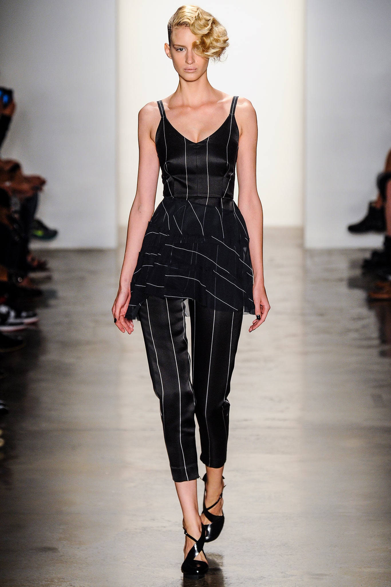 fitted black top and slim pants