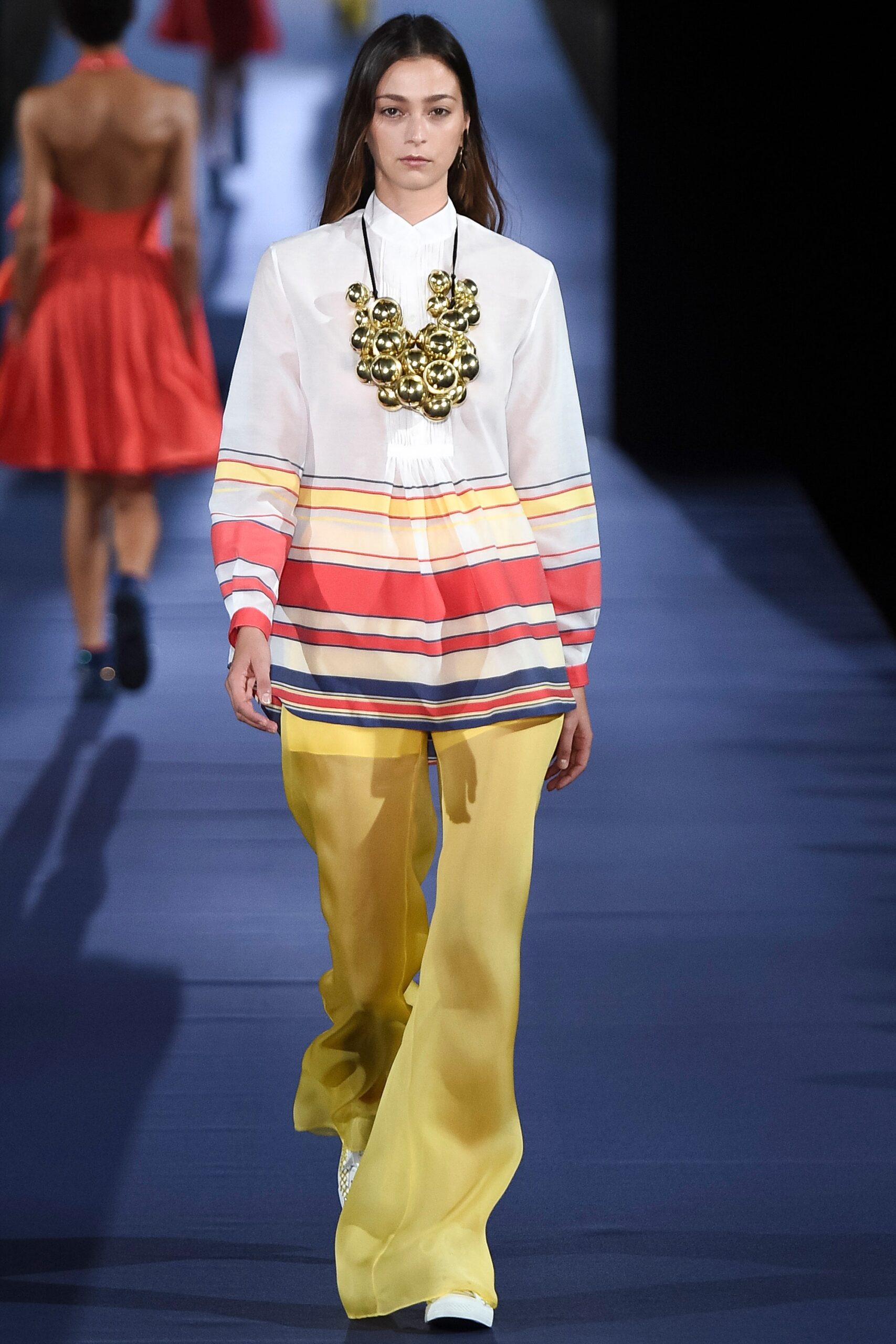 striped silk top with yellow pants