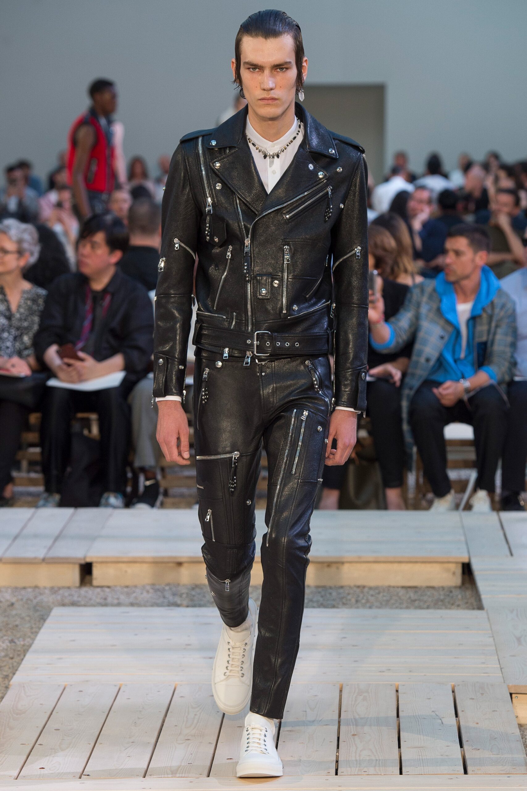 black leather long-sleeve collared fitted zippered pockets jacket