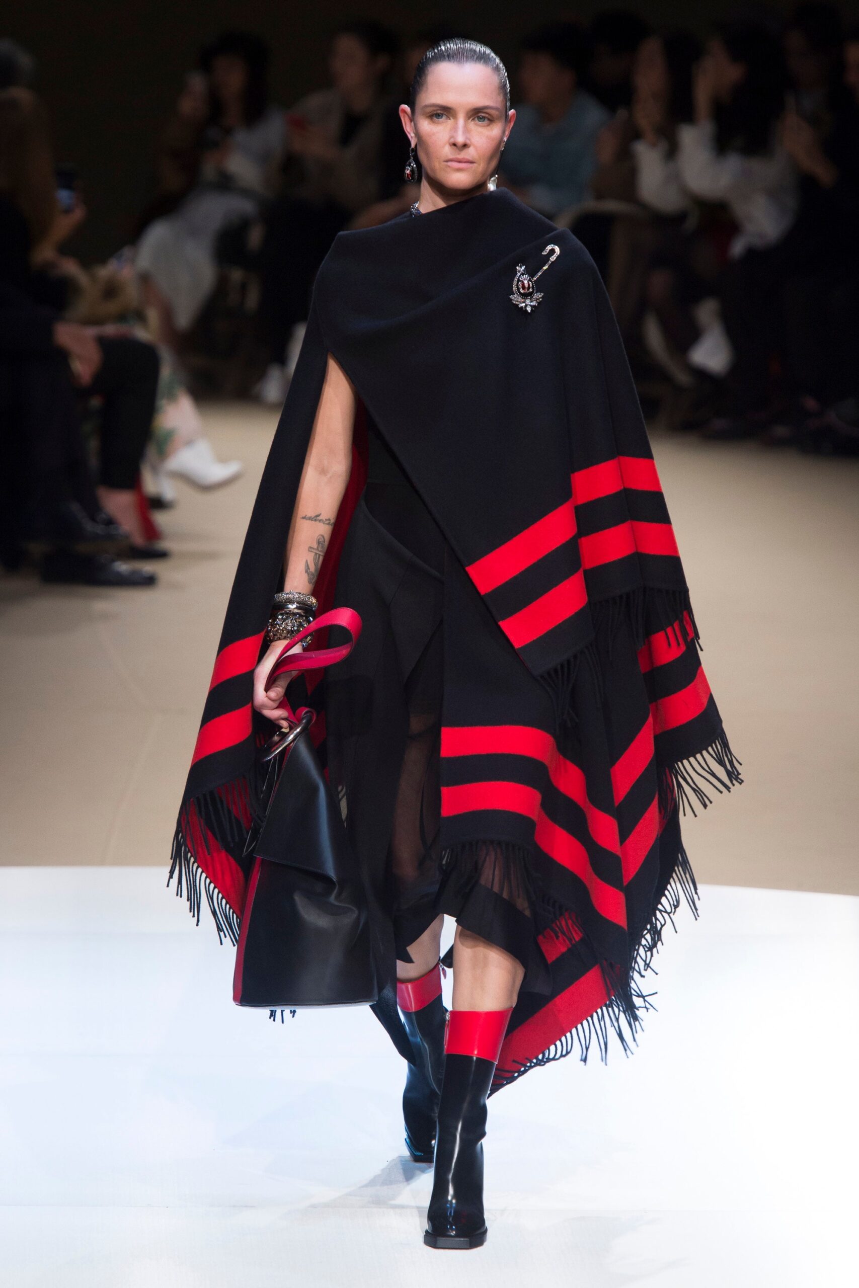 black and red poncho with fitted dress