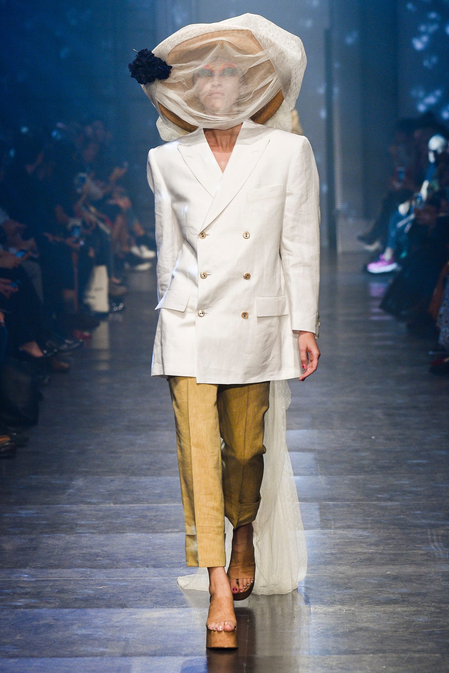 white tailored blazer with beige pants
