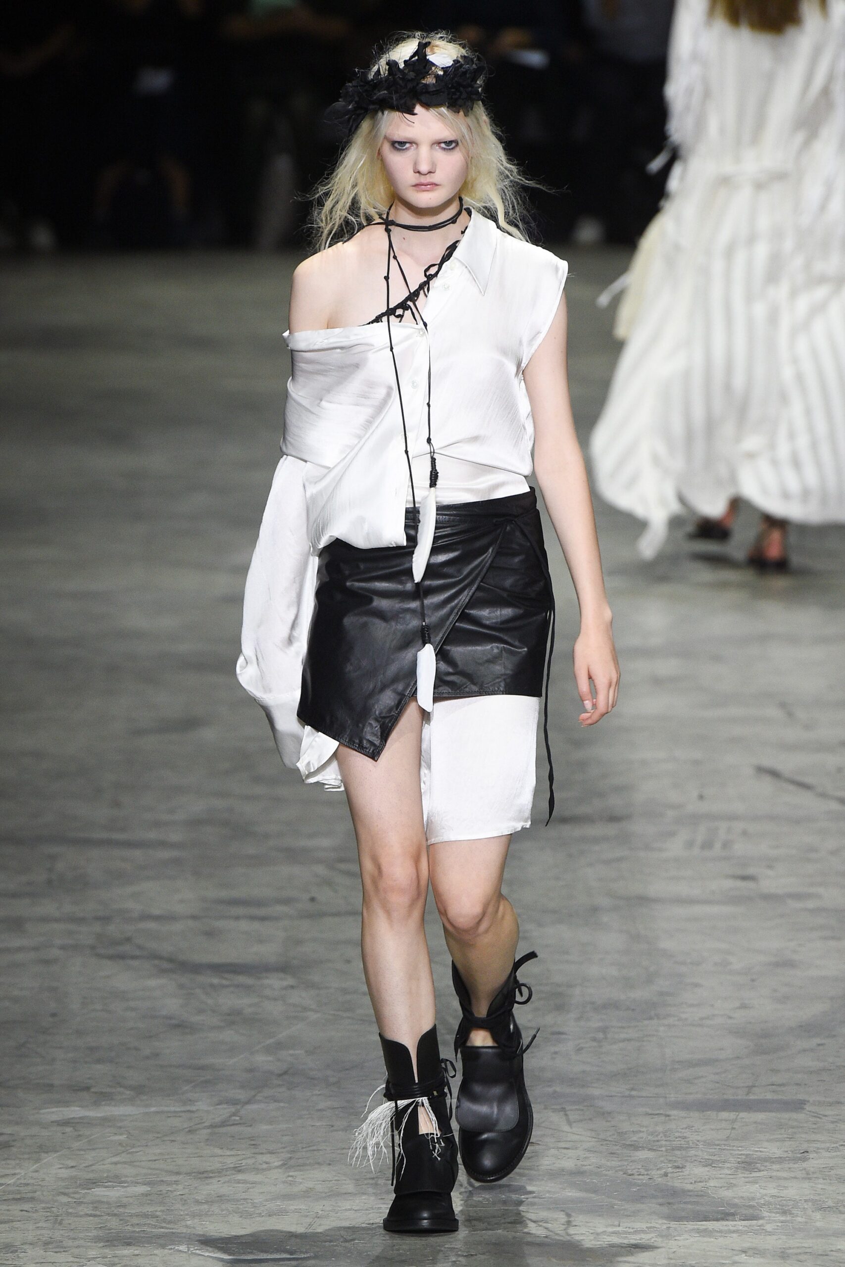 white relaxed shirt with black leather skirt