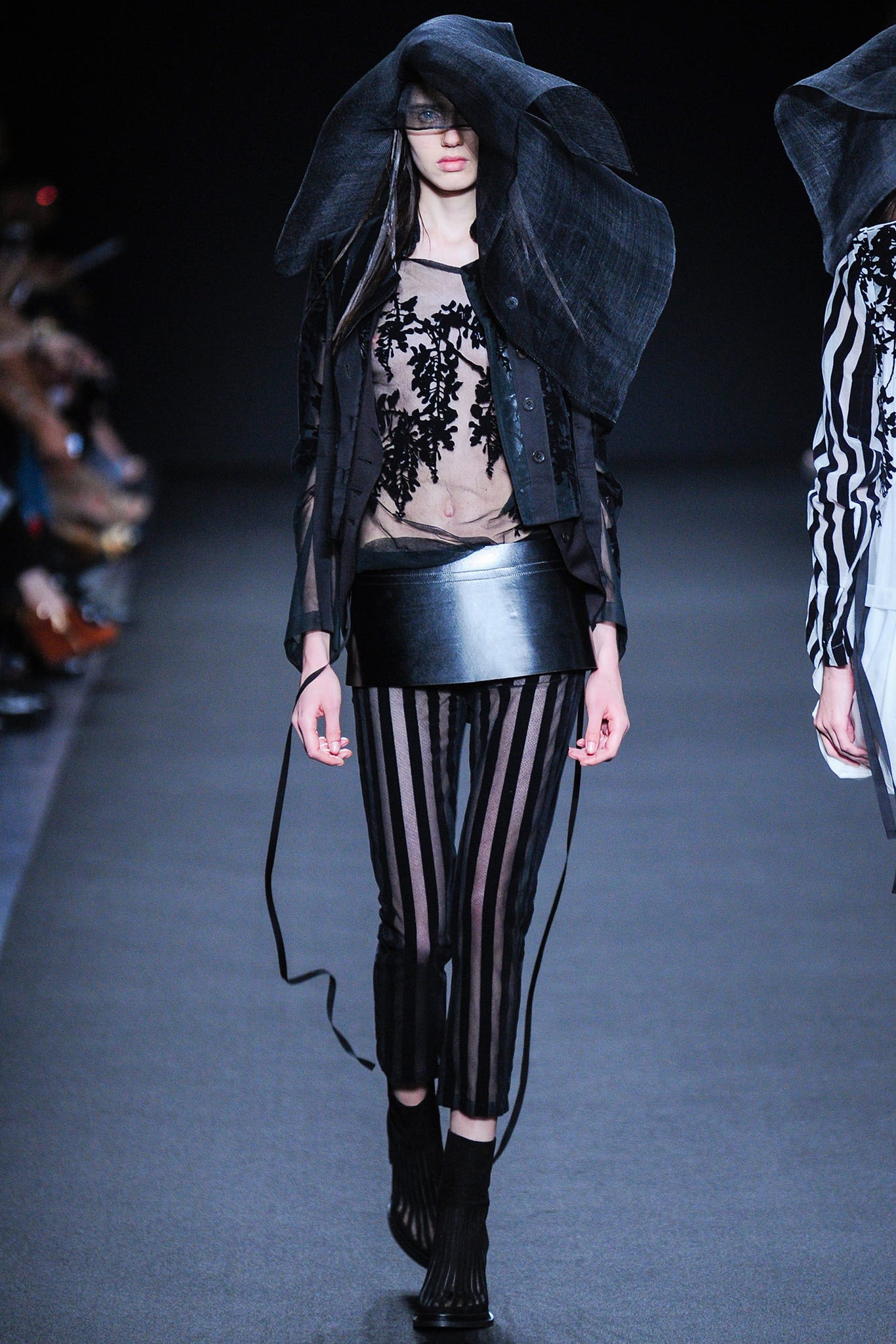 black sheer top with mini skirt